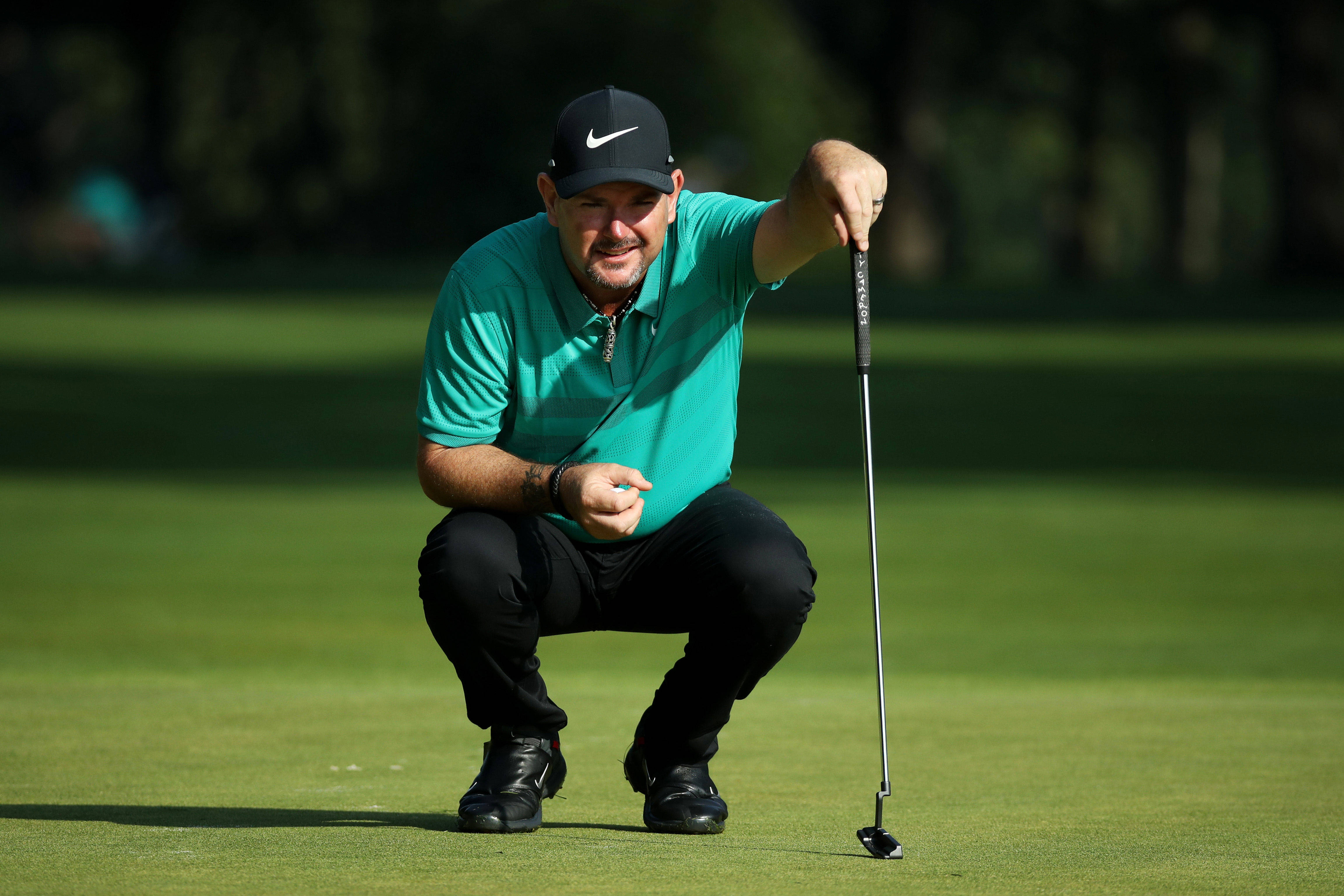 Rory Sabbatini, teal shirt, sunlit green golf course, 4K Desktop Wallpaper