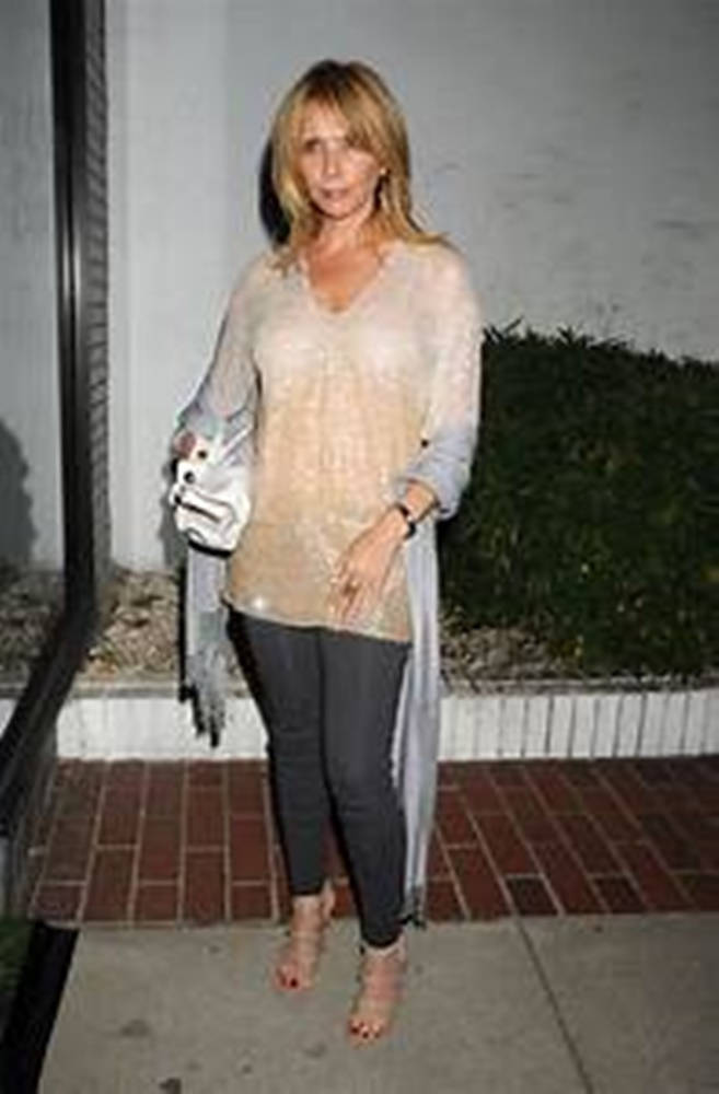 Rosanna Arquette, sheer gold top, dark pants, SD Phone Wallpaper