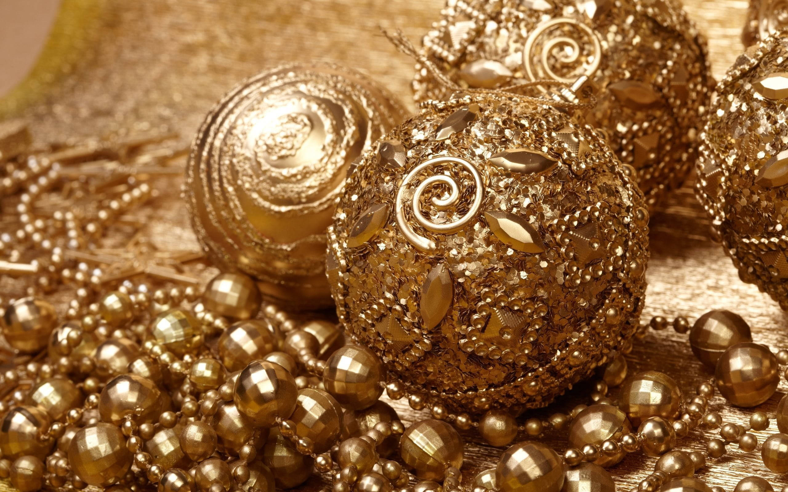 Golden Christmas Balls Ornament, gold surface, intricate swirls, 2K Desktop Wallpaper