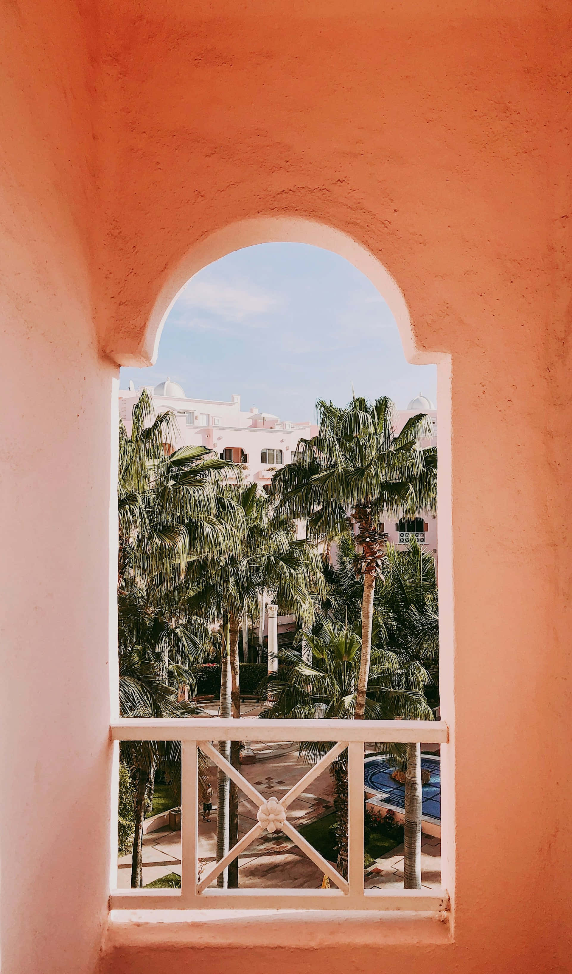 rose gold pastel tropical view, terracotta arched window, lush palm trees, 2K Phone Wallpaper