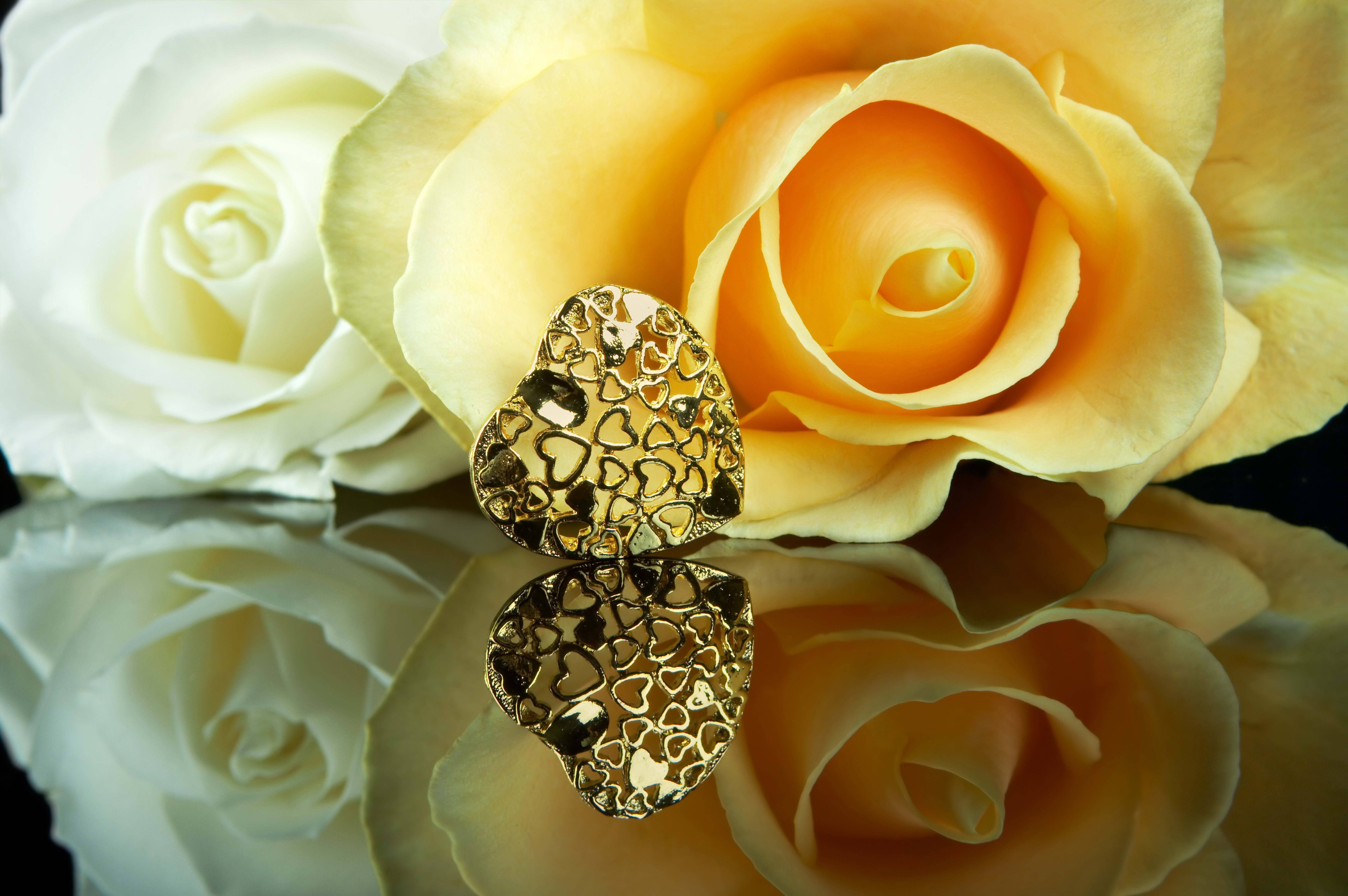 gold heart-shaped brooch, heart cutouts, reflective surface, 5K Desktop Wallpaper