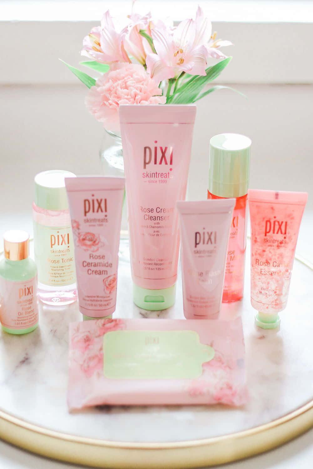 rose oil, pink Pixi skincare products, marble tray, HD Phone Wallpaper
