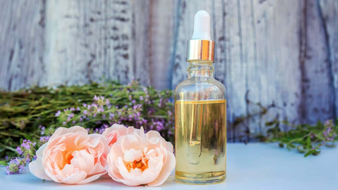 Rose Oil, glass dropper bottle, golden essential oil, SD Desktop Wallpaper