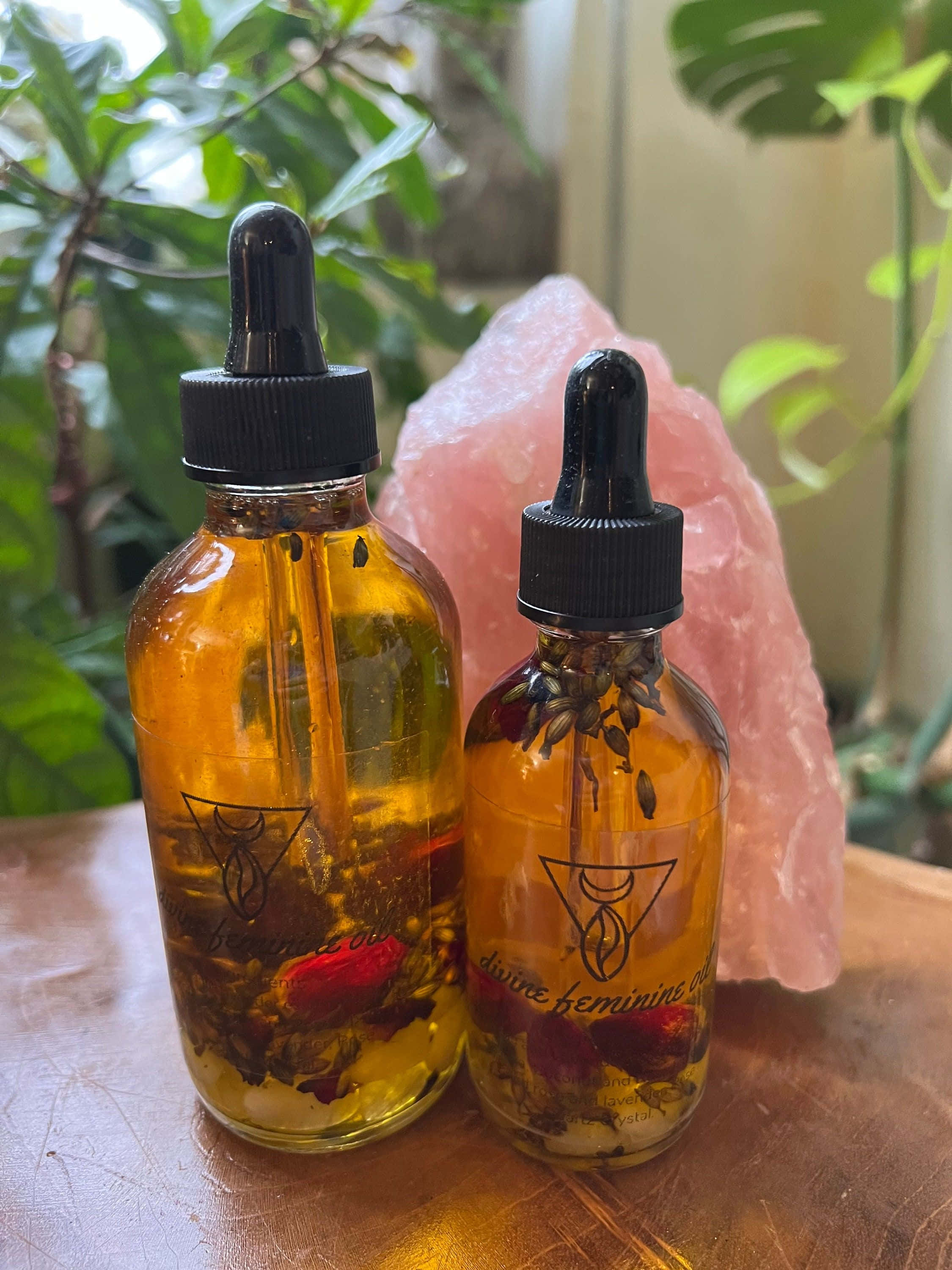 rose oil, amber glass bottle, pink crystal, 2K Phone Wallpaper