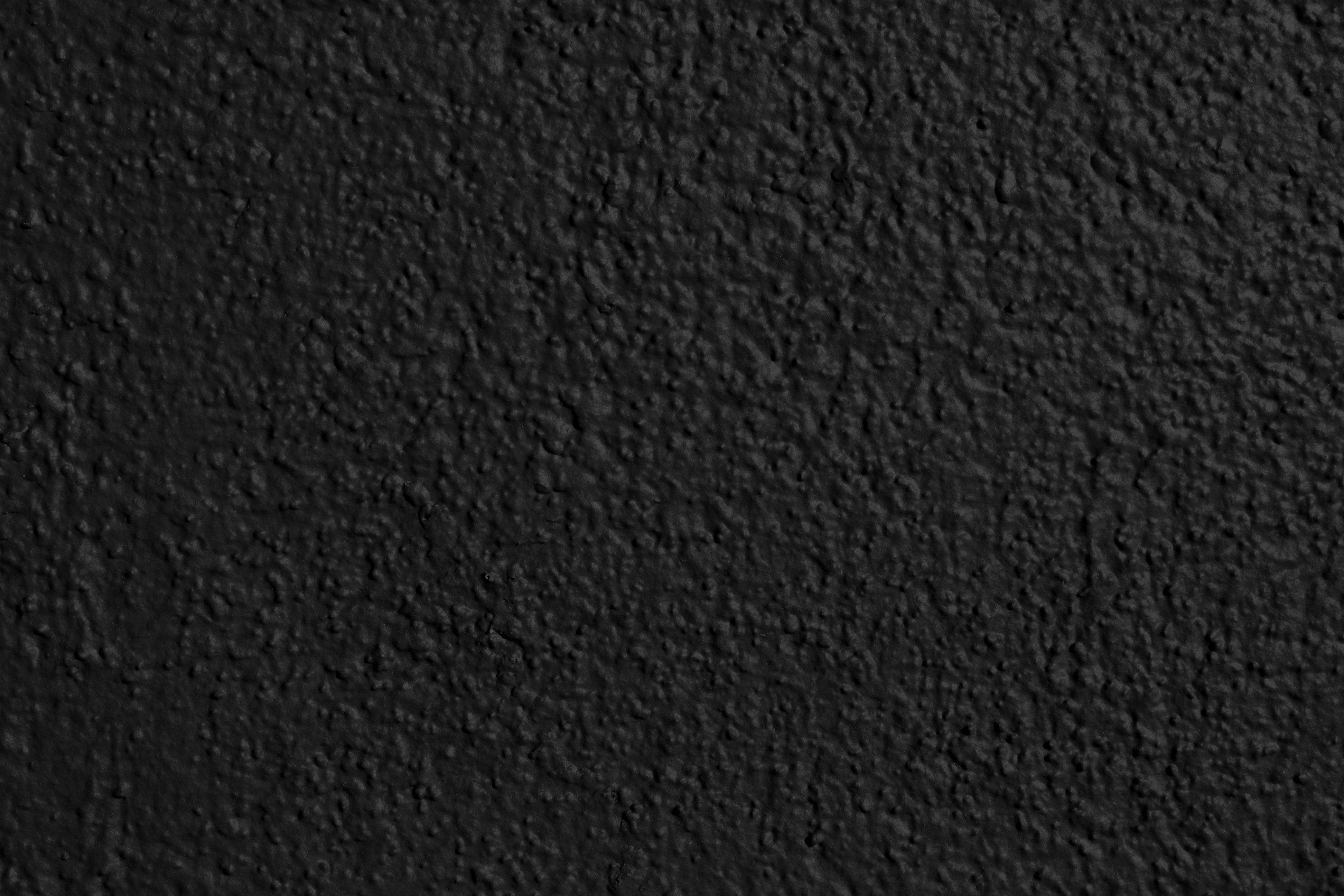 pain black and white stoned texture, rough black stucco wall, subtle texture variations, 4K Desktop Wallpaper
