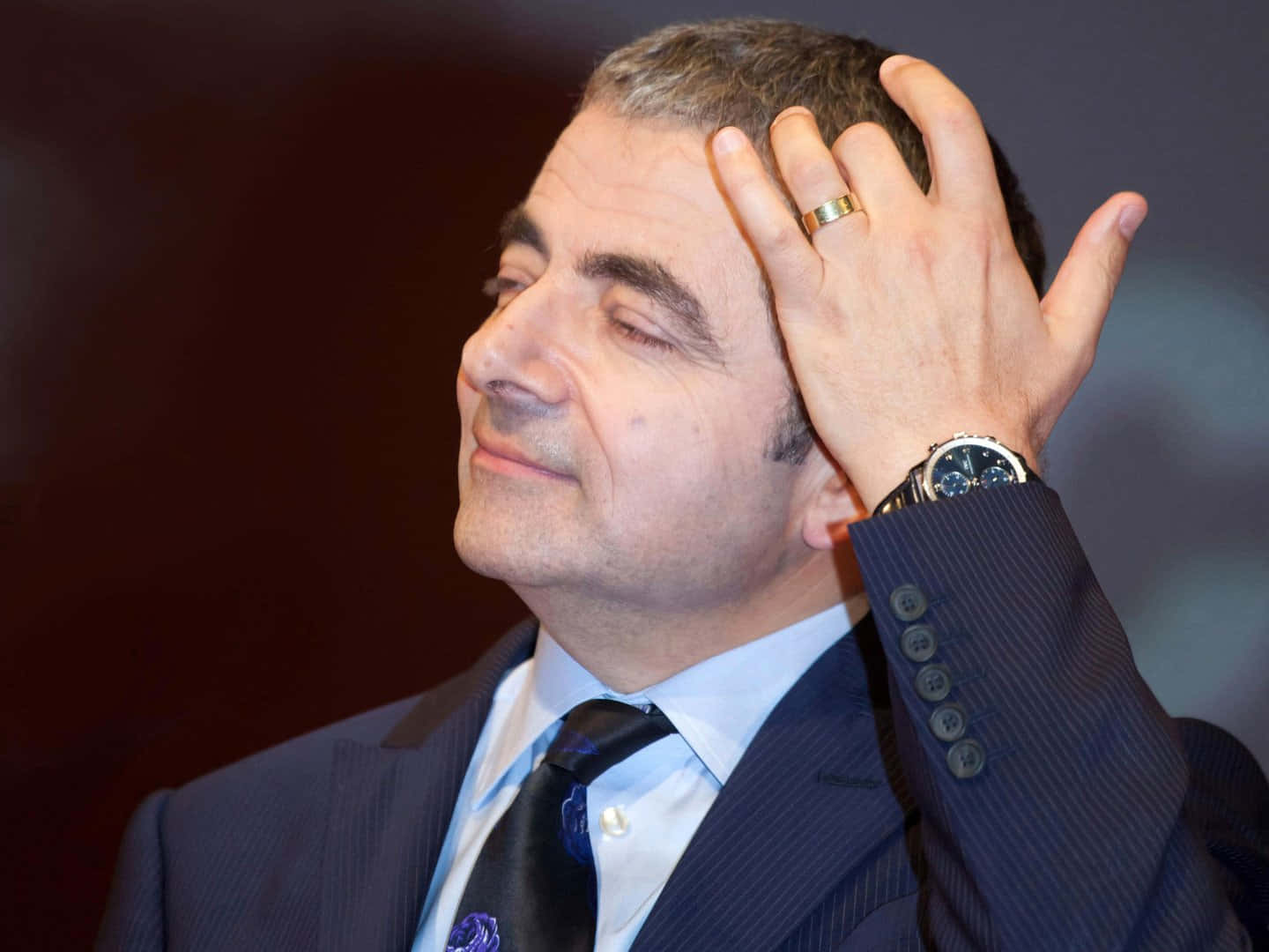 Rowan Atkinson, dark pinstripe suit, eyes closed, HD Desktop Wallpaper