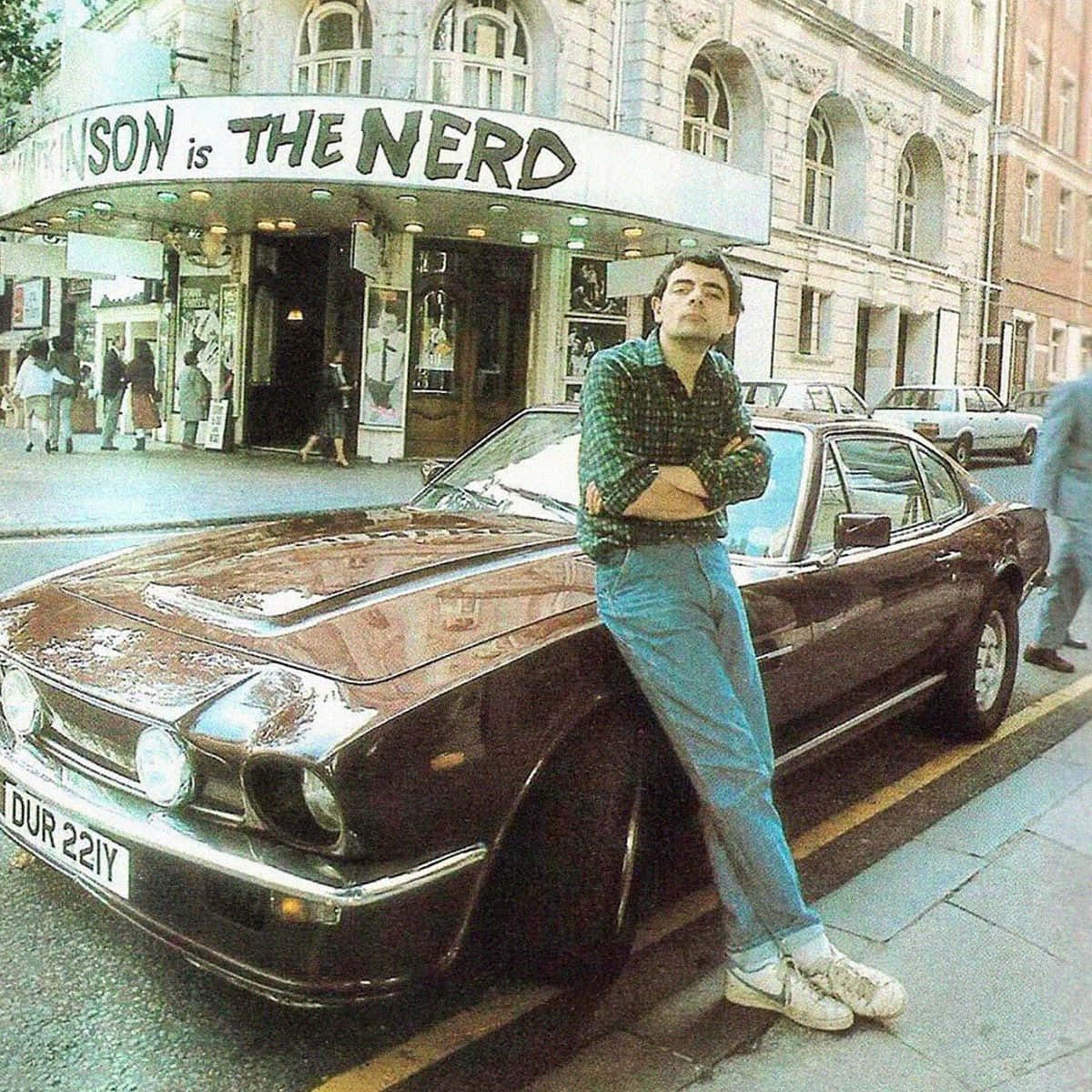 Rowan Atkinson, green plaid shirt, dark brown classic car, SD Desktop Wallpaper