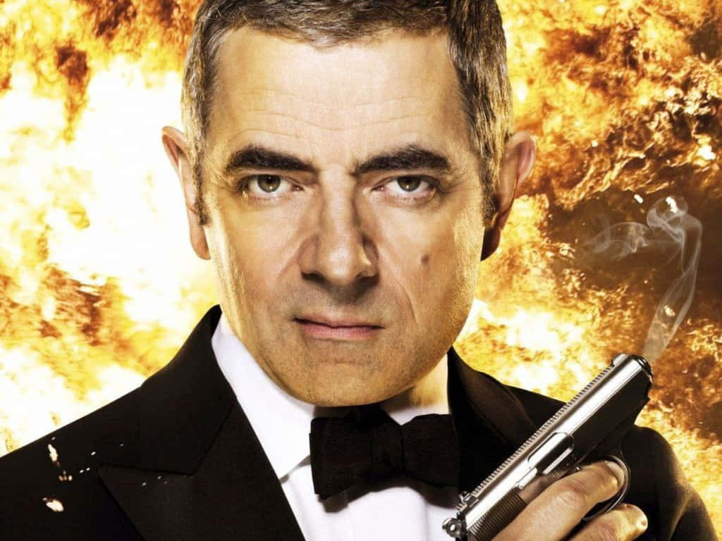 Rowan Atkinson, black tuxedo, smoking pistol, SD Desktop Wallpaper