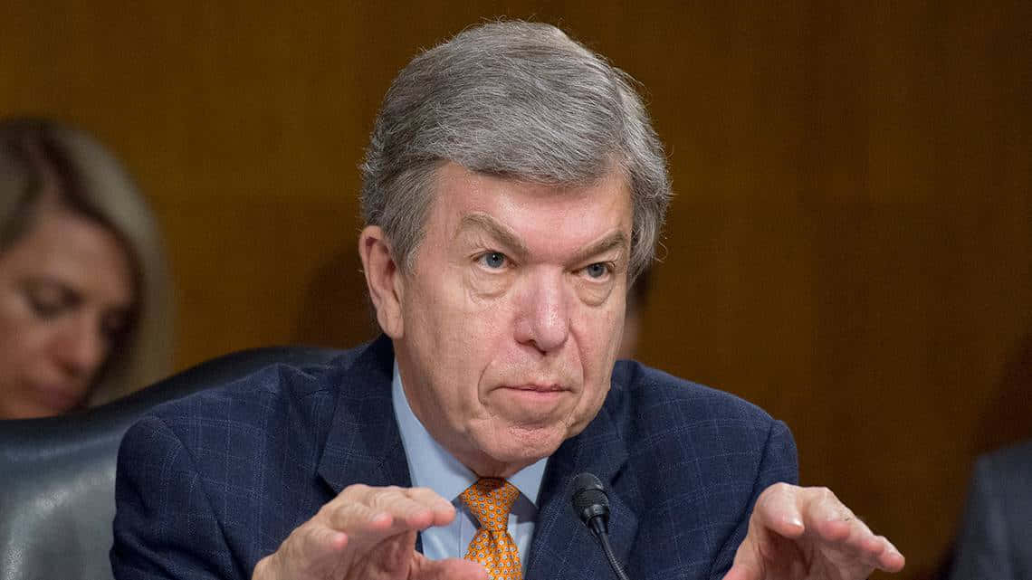 Roy Blunt, blue suit, orange tie, SD Desktop Wallpaper