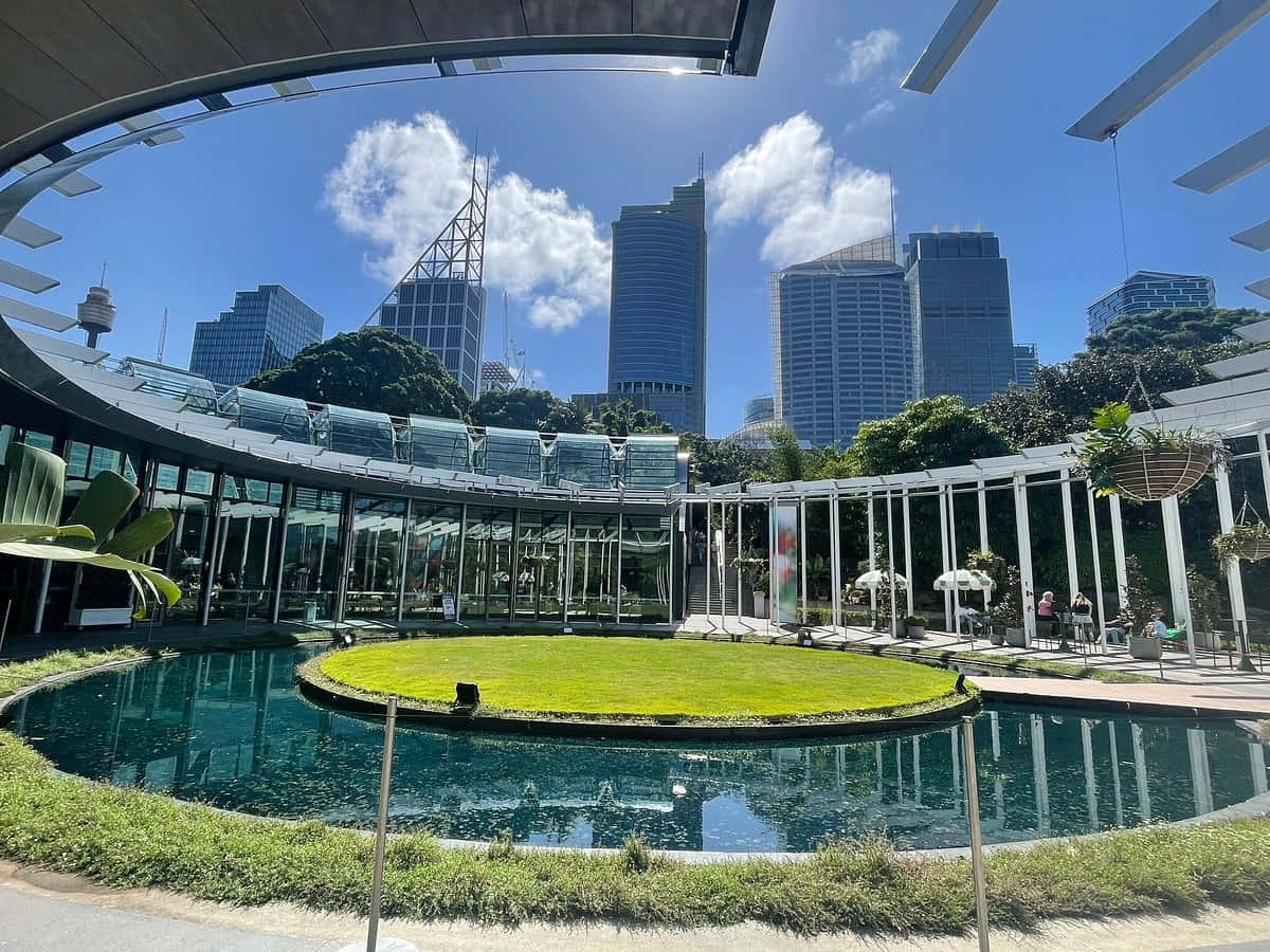Royal Botanic Garden Sydney, curved glass building, circular green lawn, SD Desktop Wallpaper