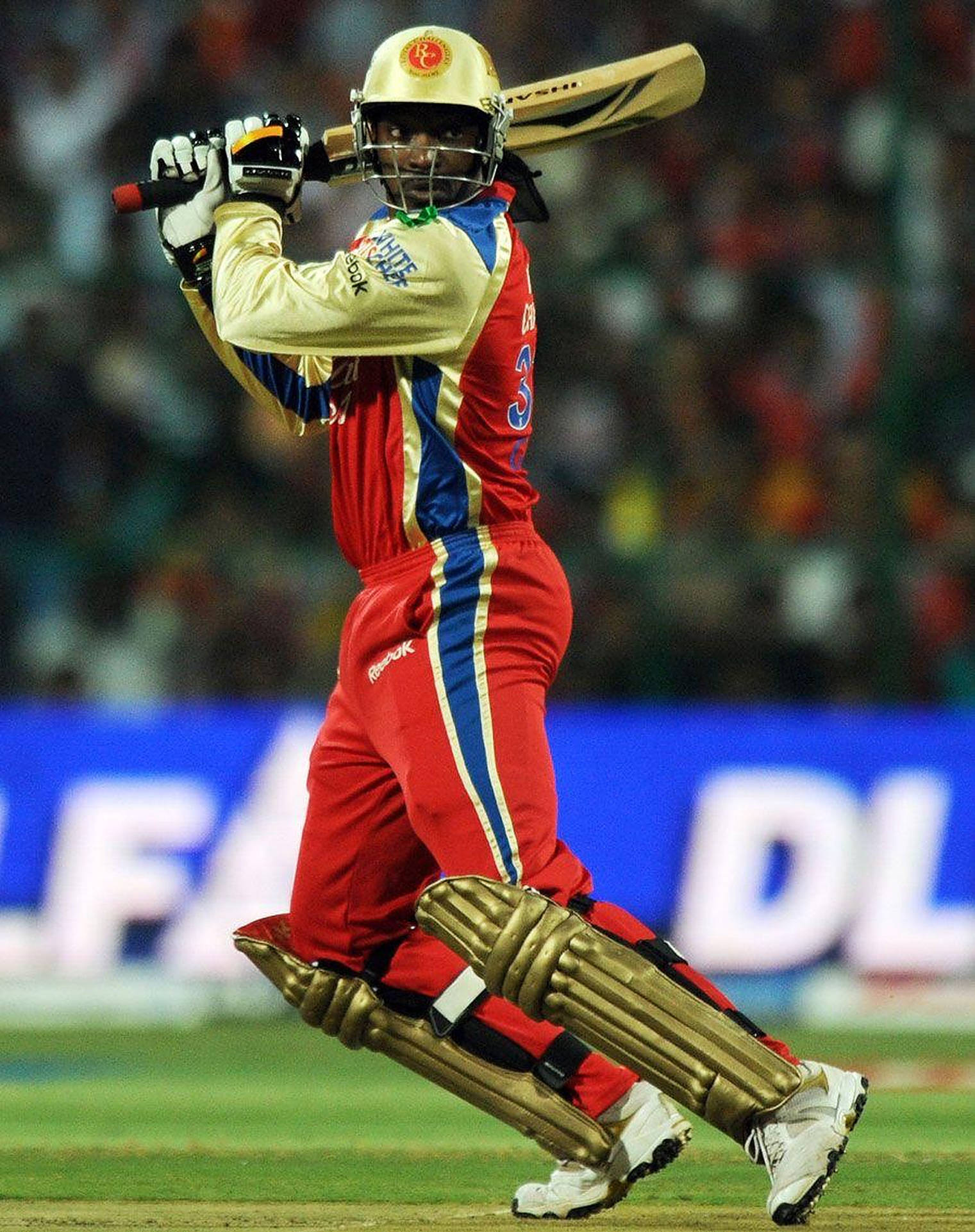 Royal Challengers Bangalore, red gold and blue uniform, green field, Full HD Phone Wallpaper