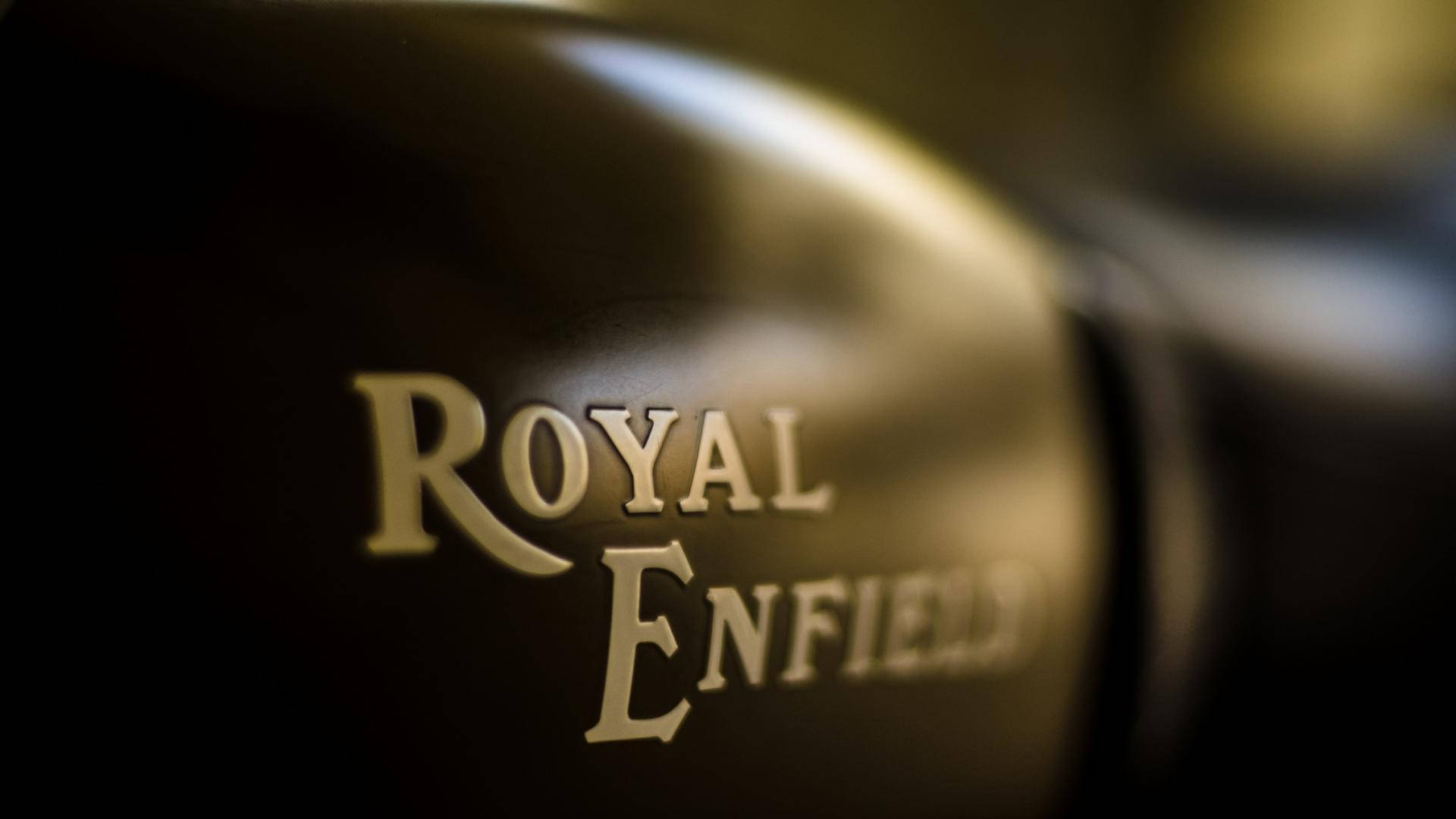 Royal Enfield HD, golden Royal Enfield logo, sleek black motorcycle fuel tank, Full HD Desktop Wallpaper