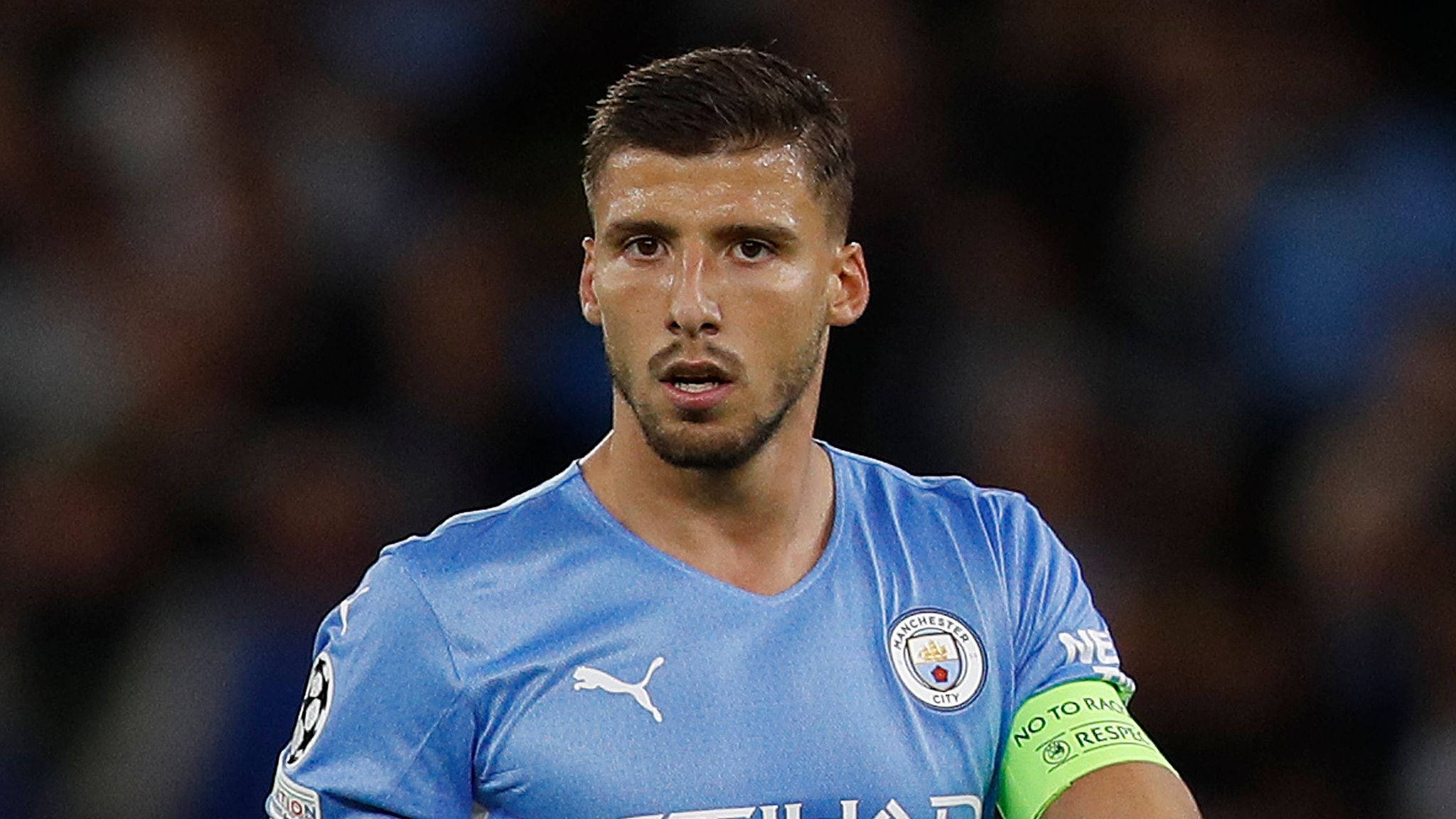 Ruben Dias, light blue Manchester City jersey, green captain's armband, Full HD Desktop Wallpaper