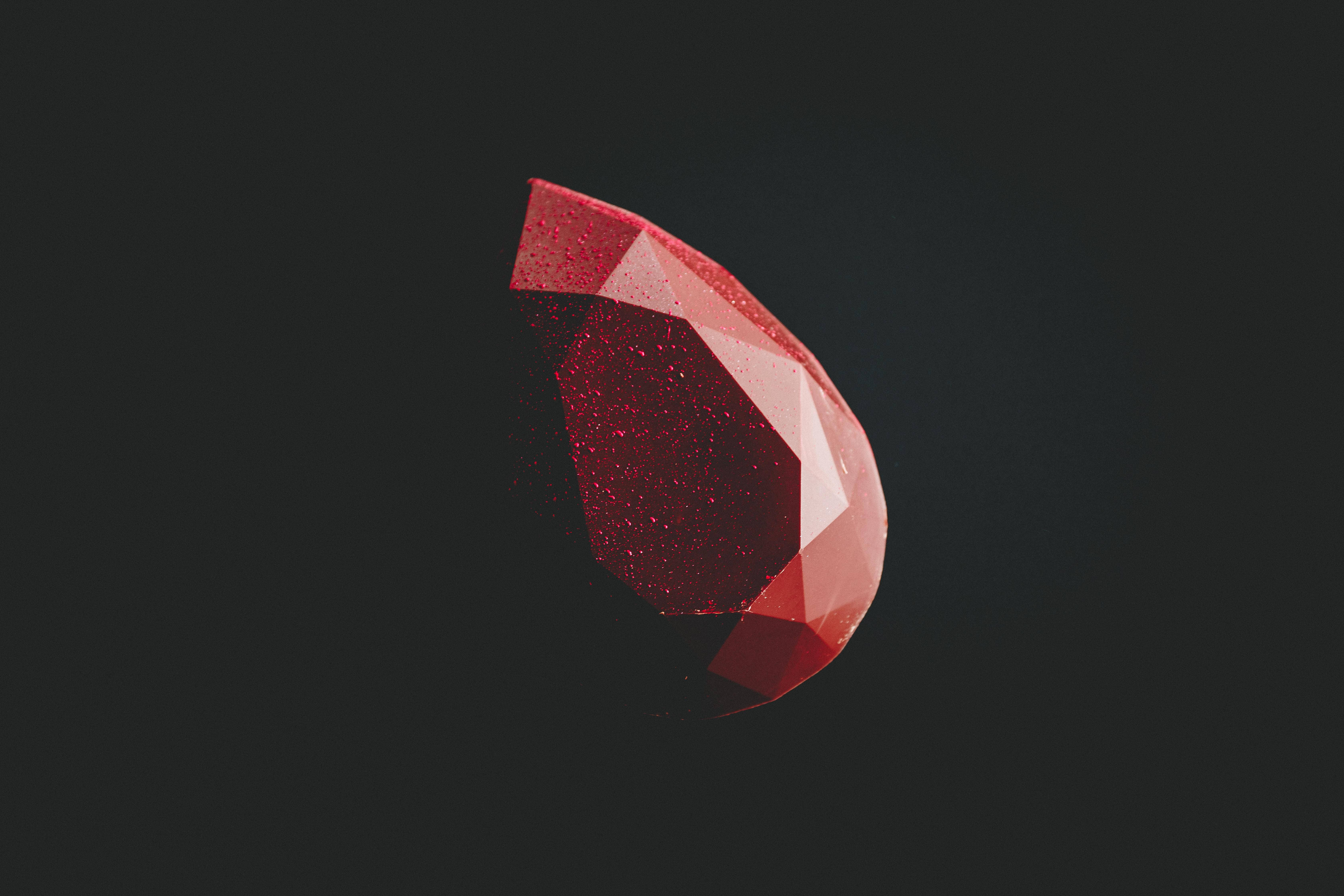 Dark Minimalist Ruby, faceted red gemstone, glittering facets, 5K Desktop Wallpaper