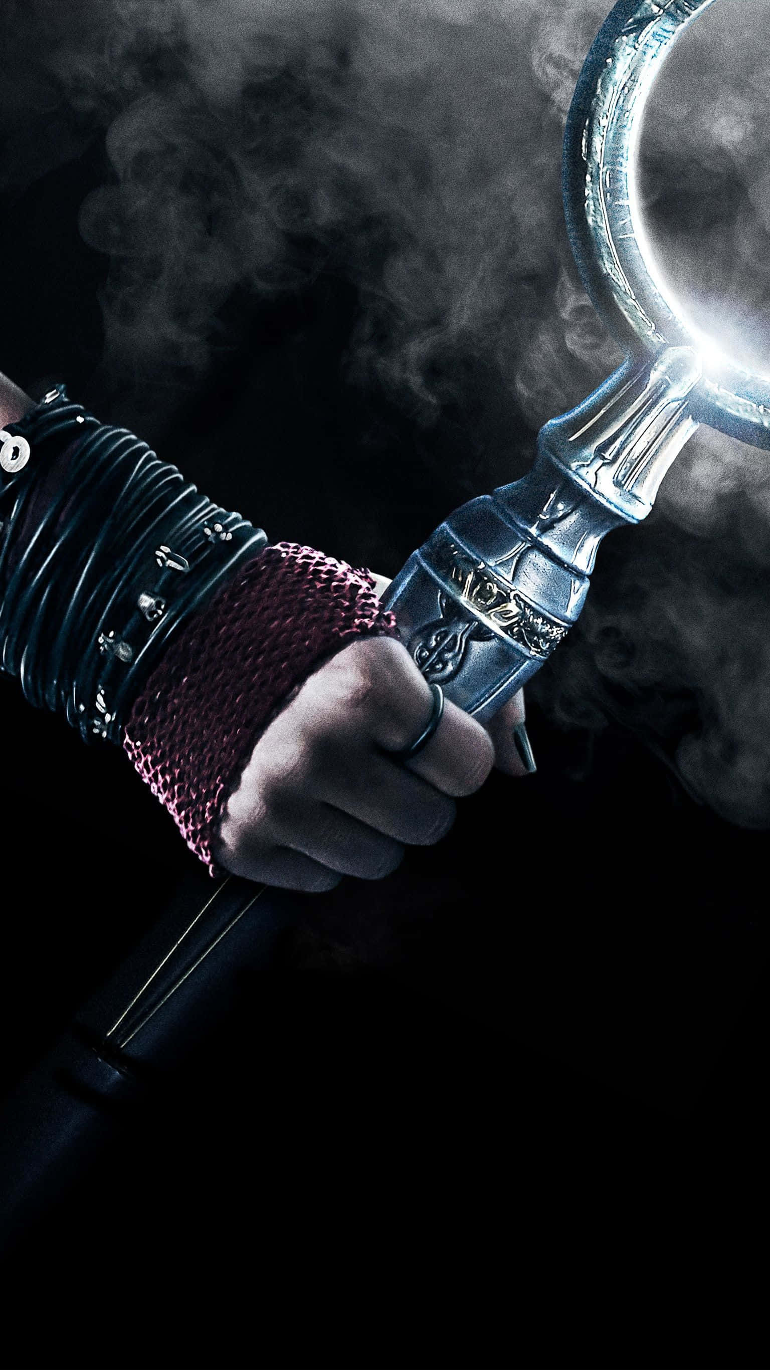 Runaways, gloved hand, glowing ornate staff, 2K Phone Wallpaper