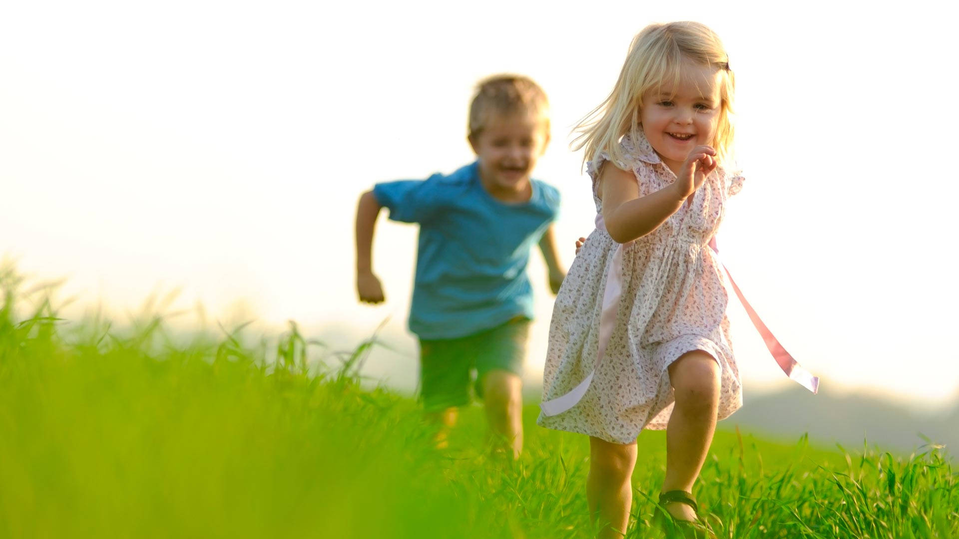 running children, grass field, vibrant green grass, Full HD Desktop Wallpaper
