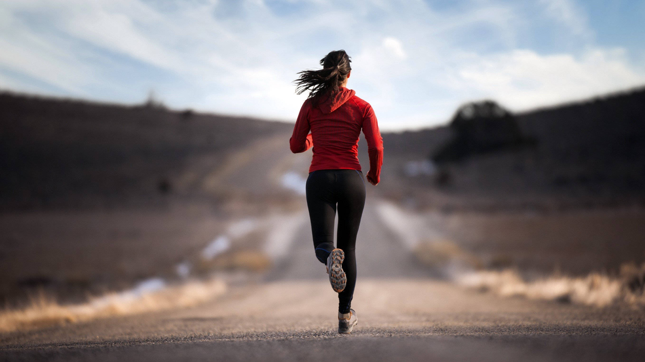 red hoodie, dusty road, barren landscape, 2K Desktop Wallpaper