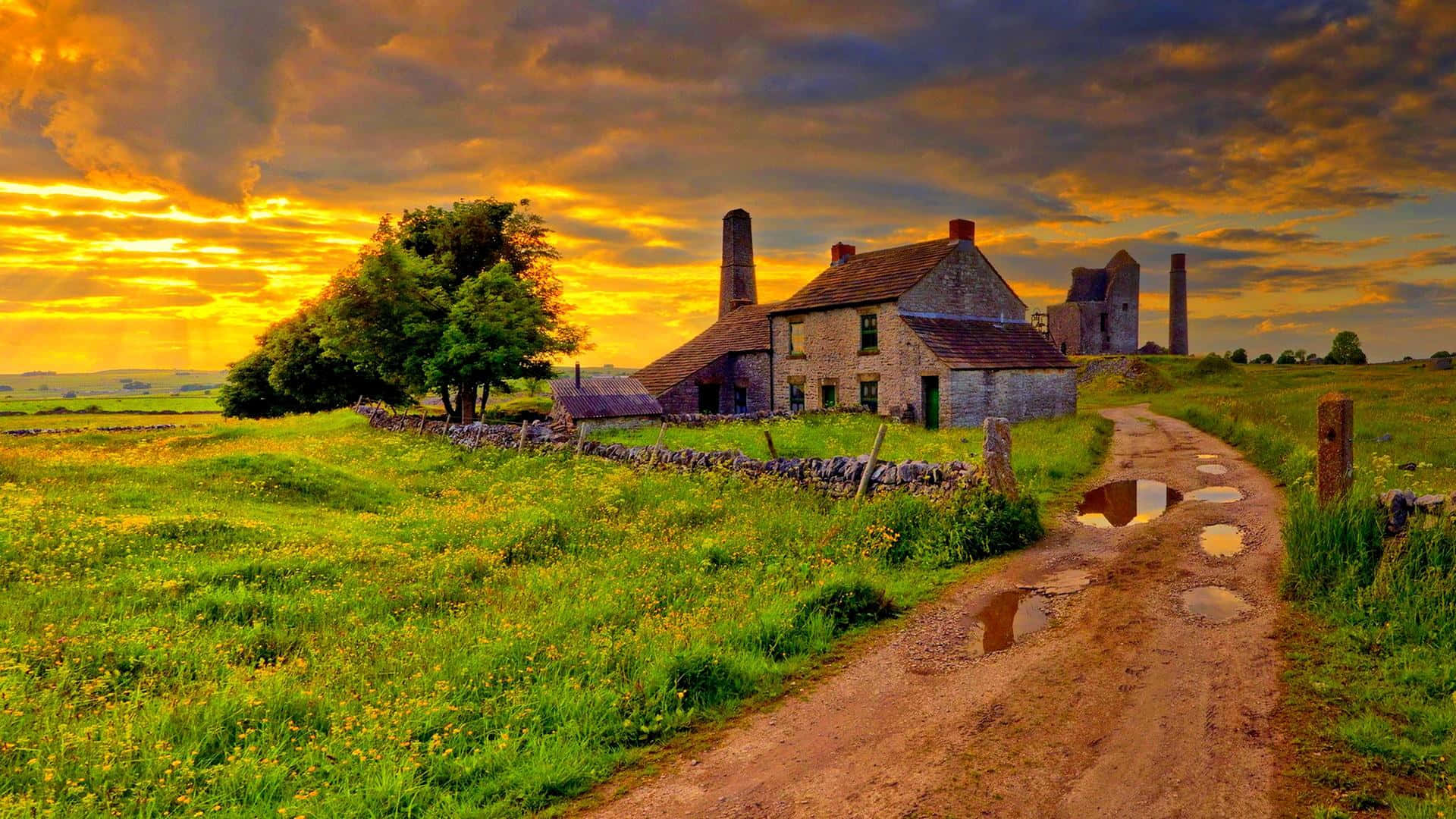 rustic stone farmhouse, dramatic golden sunset sky, winding dirt path, Full HD Desktop Wallpaper
