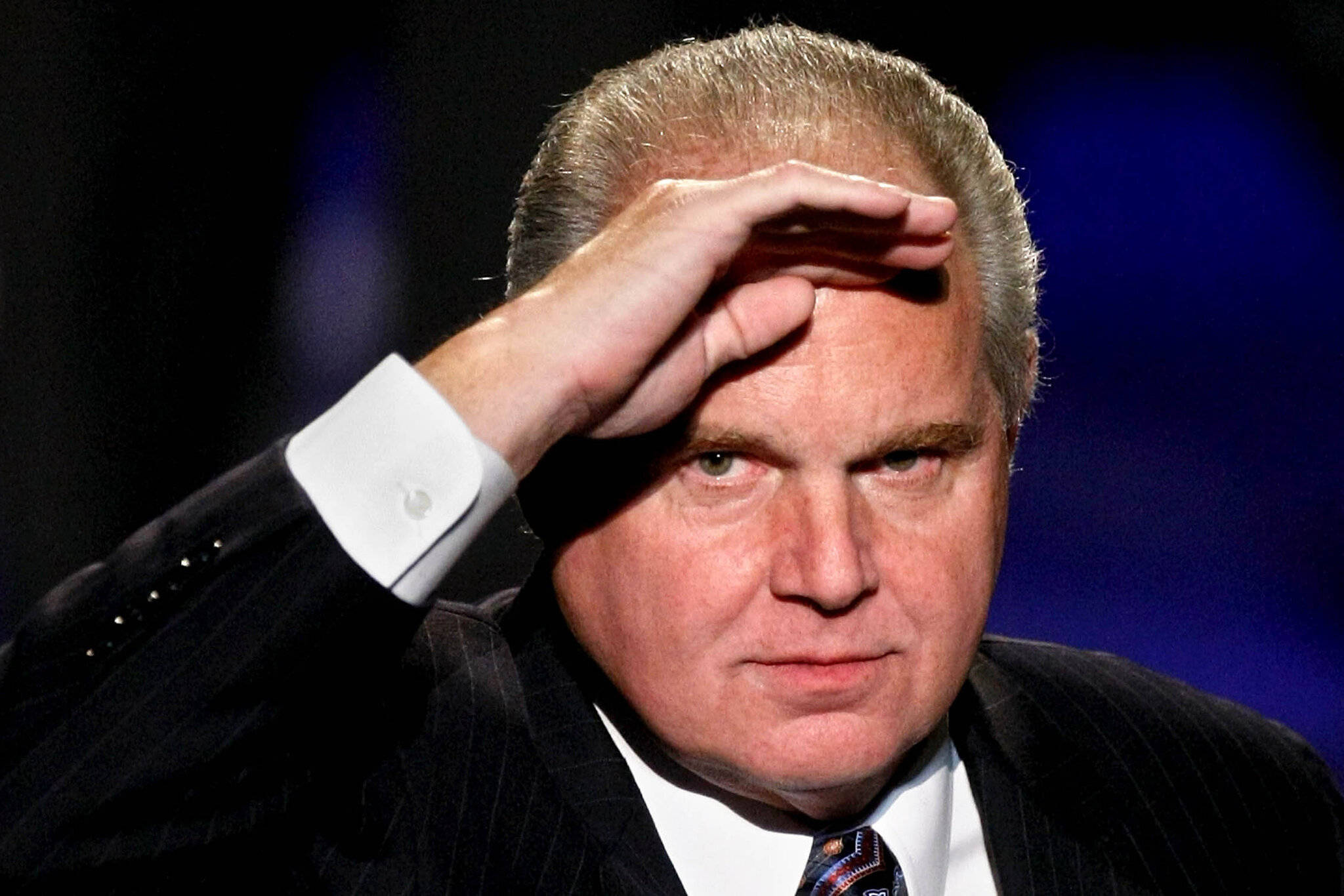 Rush Limbaugh, dark pinstripe suit, blurred blue background, Full HD Desktop Wallpaper