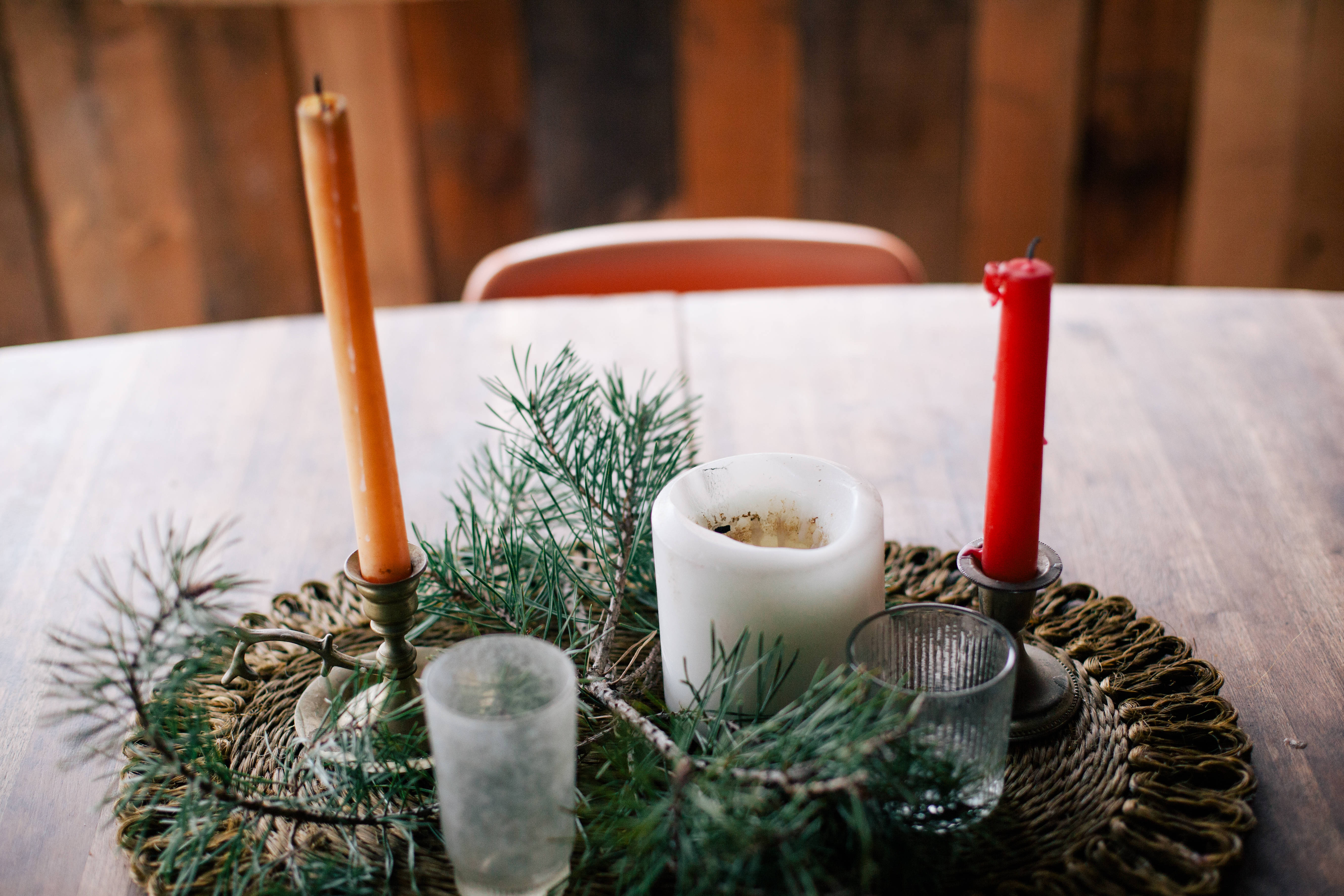rustic wooden table, woven mat, pine branches, 5K Desktop Wallpaper
