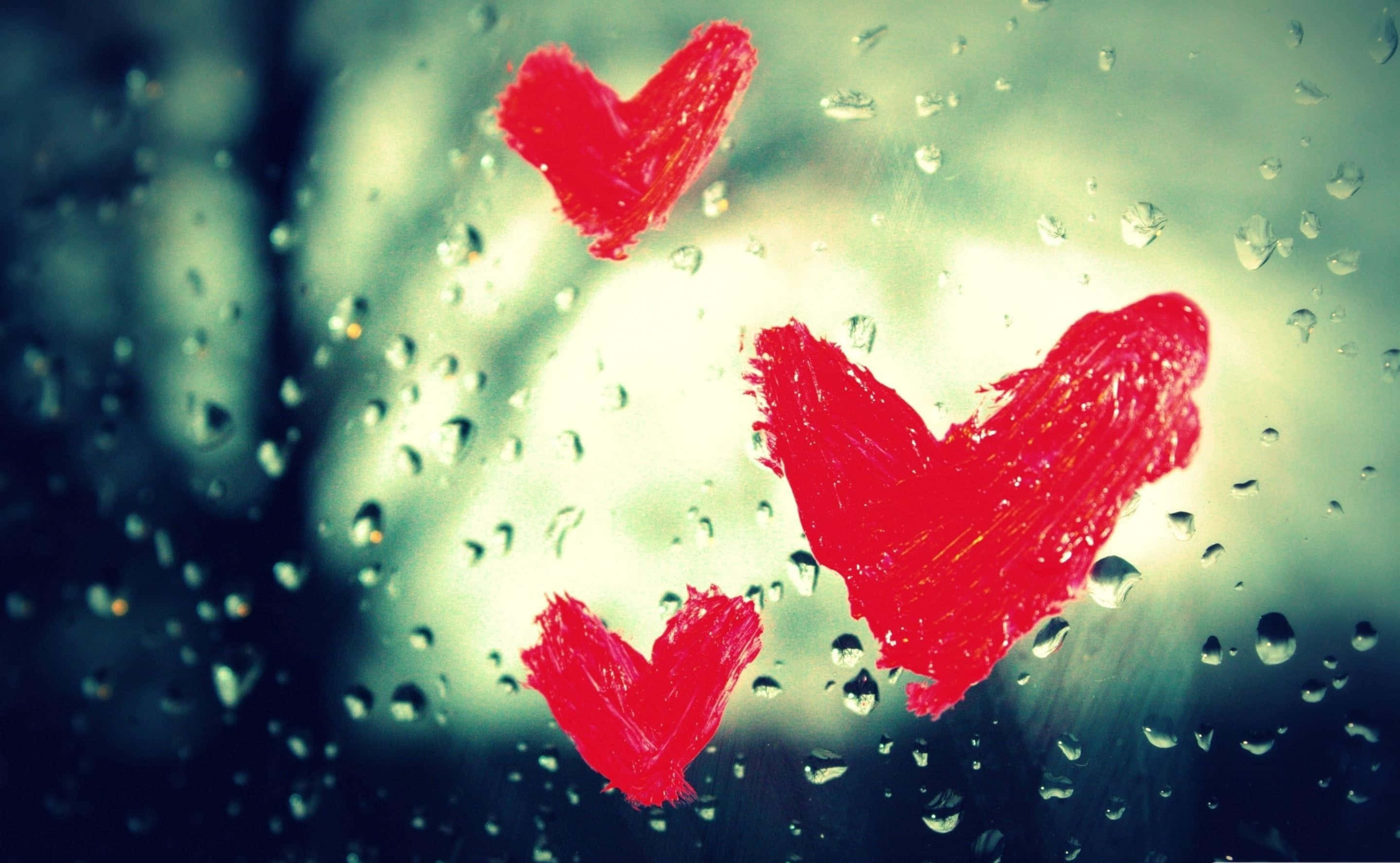 red hearts, rain-speckled window, soft blurred background, 2K Desktop Wallpaper