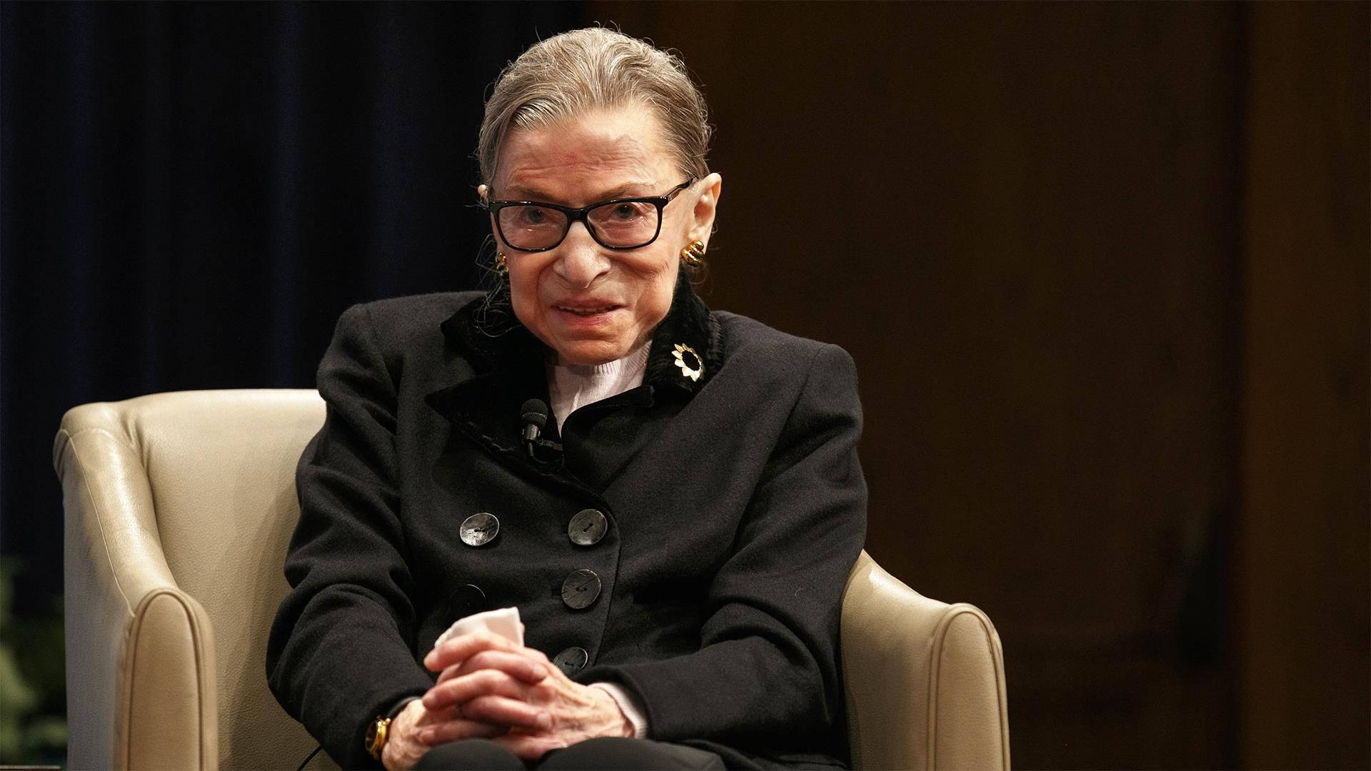 Ruth Bader Ginsburg, beige armchair, black coat, Full HD Desktop Wallpaper