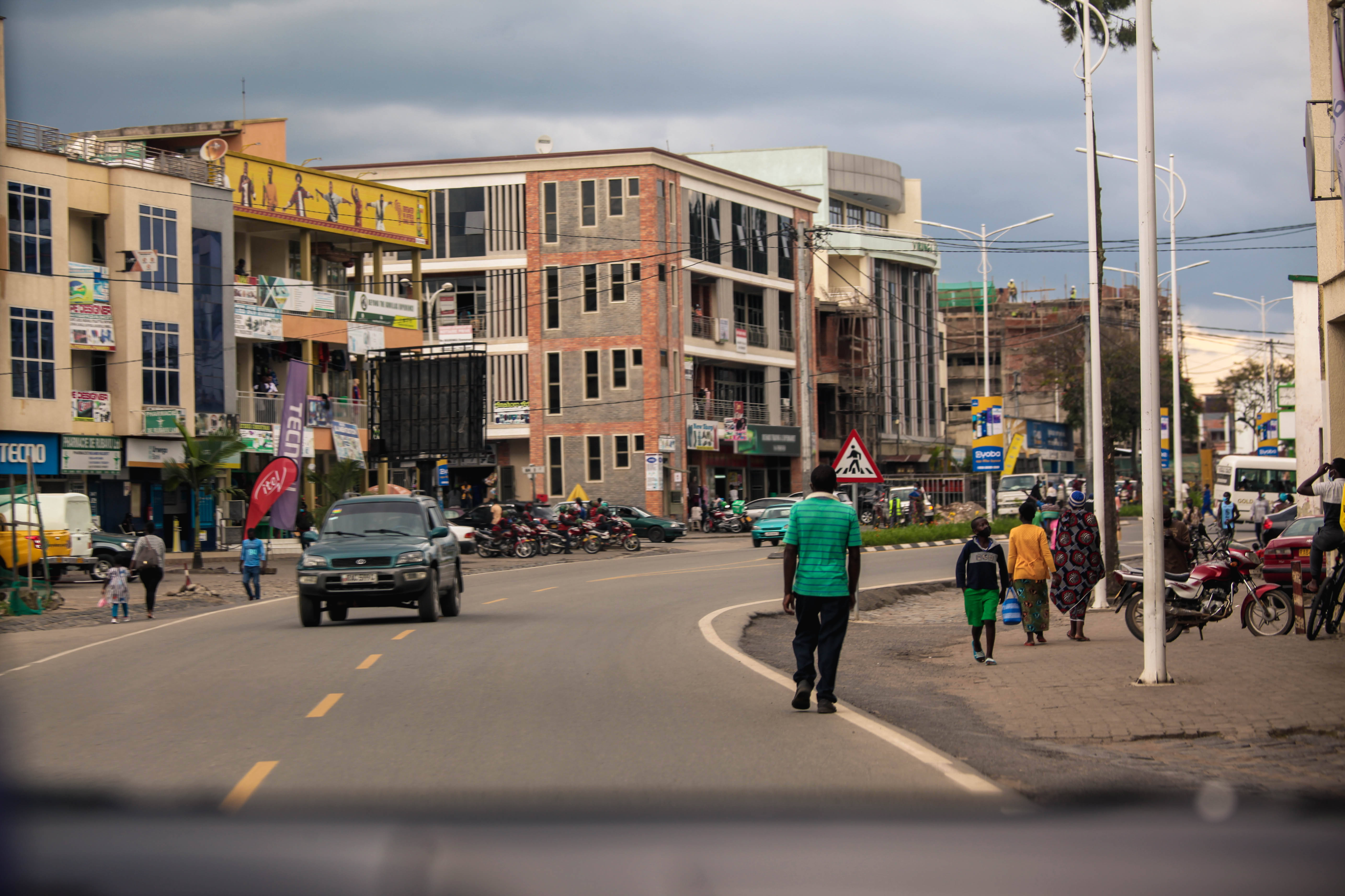 Rwanda, urban street scene, pedestrians crossing, 5K Desktop Wallpaper