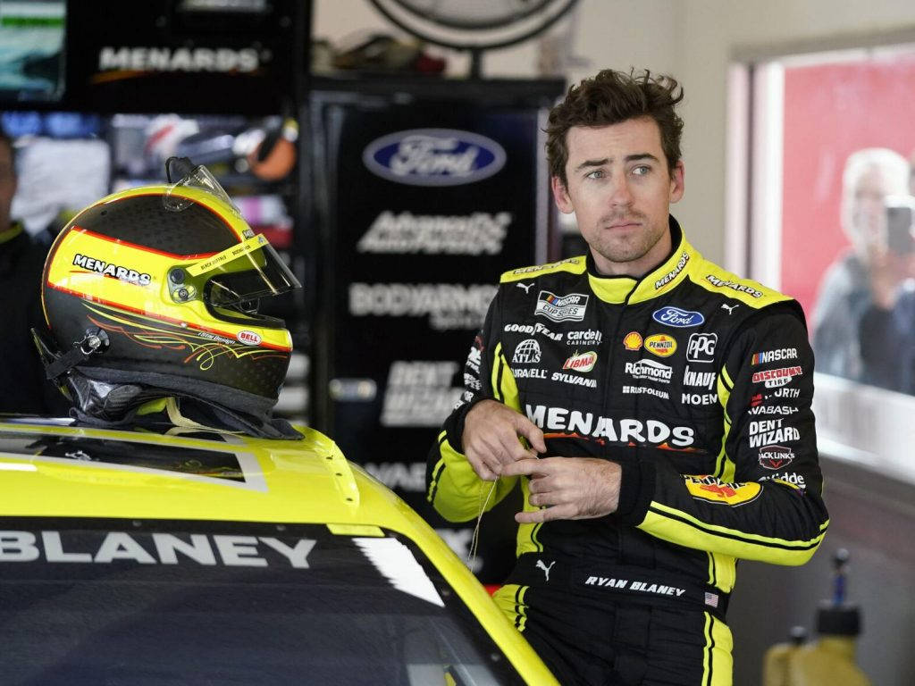 Ryan Blaney, yellow and black racing suit, bright yellow race car, SD Desktop Wallpaper