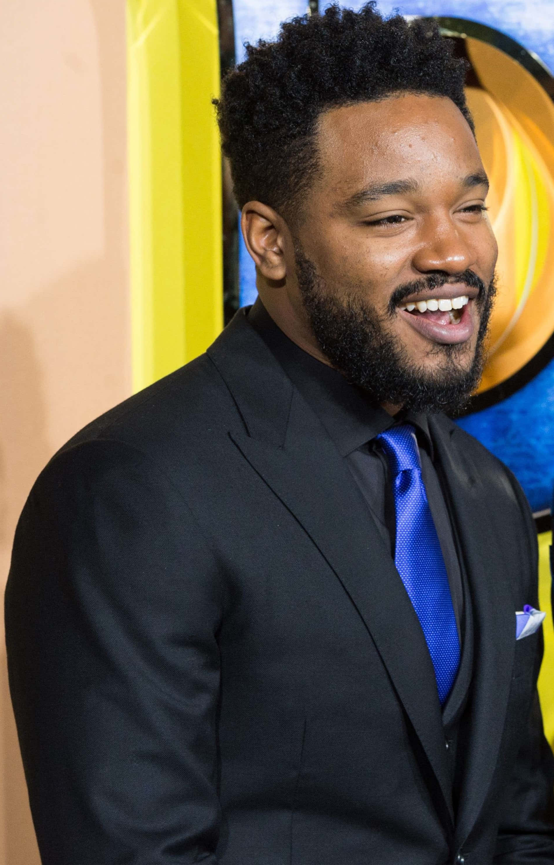 Ryan Coogler, black suit, blue tie, 2K Phone Wallpaper