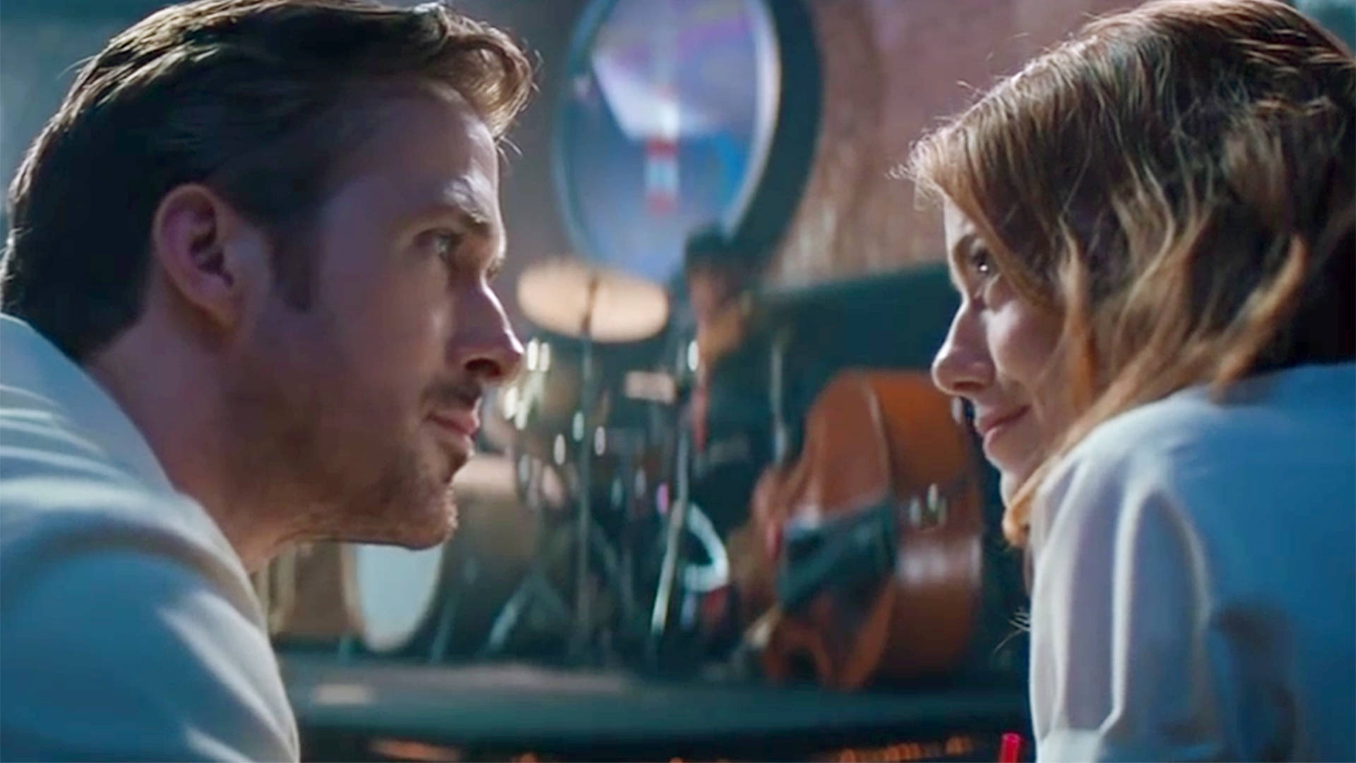 Ryan Gosling, intense stare, warmly lit bar, Full HD Desktop Wallpaper