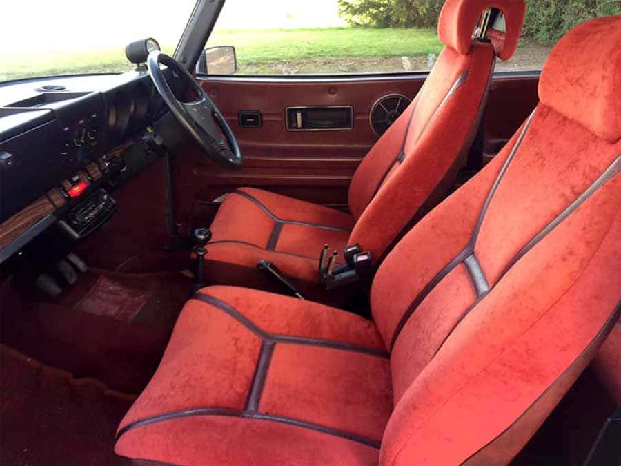 Saab 99, red velour seats, black stitching, SD Desktop Wallpaper