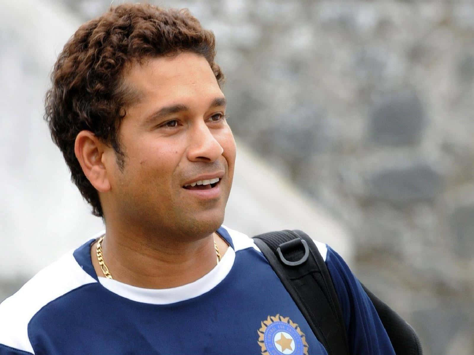 Sachin Tendulkar, blue India cricket jersey, curly brown hair, HD Desktop Wallpaper