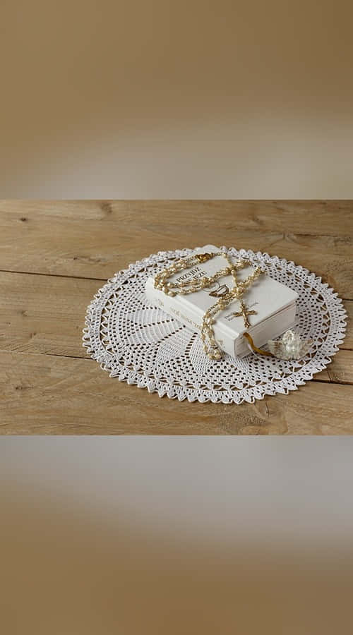 Sacrament, white book, gold rosary, SD Phone Wallpaper
