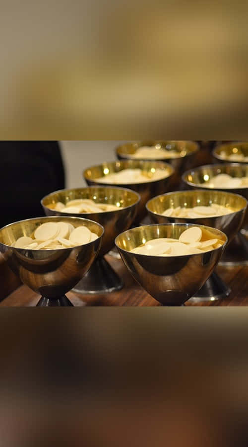 Sacrament, golden chalice bowls, pale round wafers, SD Phone Wallpaper