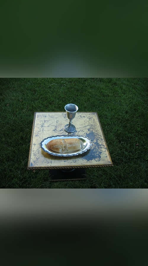 Sacrament 500 x 900, silver chalice, bread, SD Phone Wallpaper