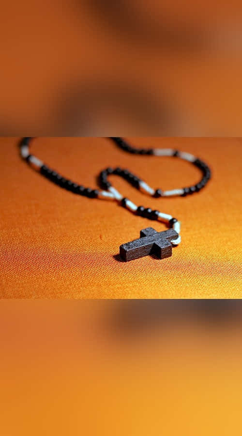Sacrament 500 x 900, wooden cross pendant, black and white beaded necklace, SD Phone Wallpaper