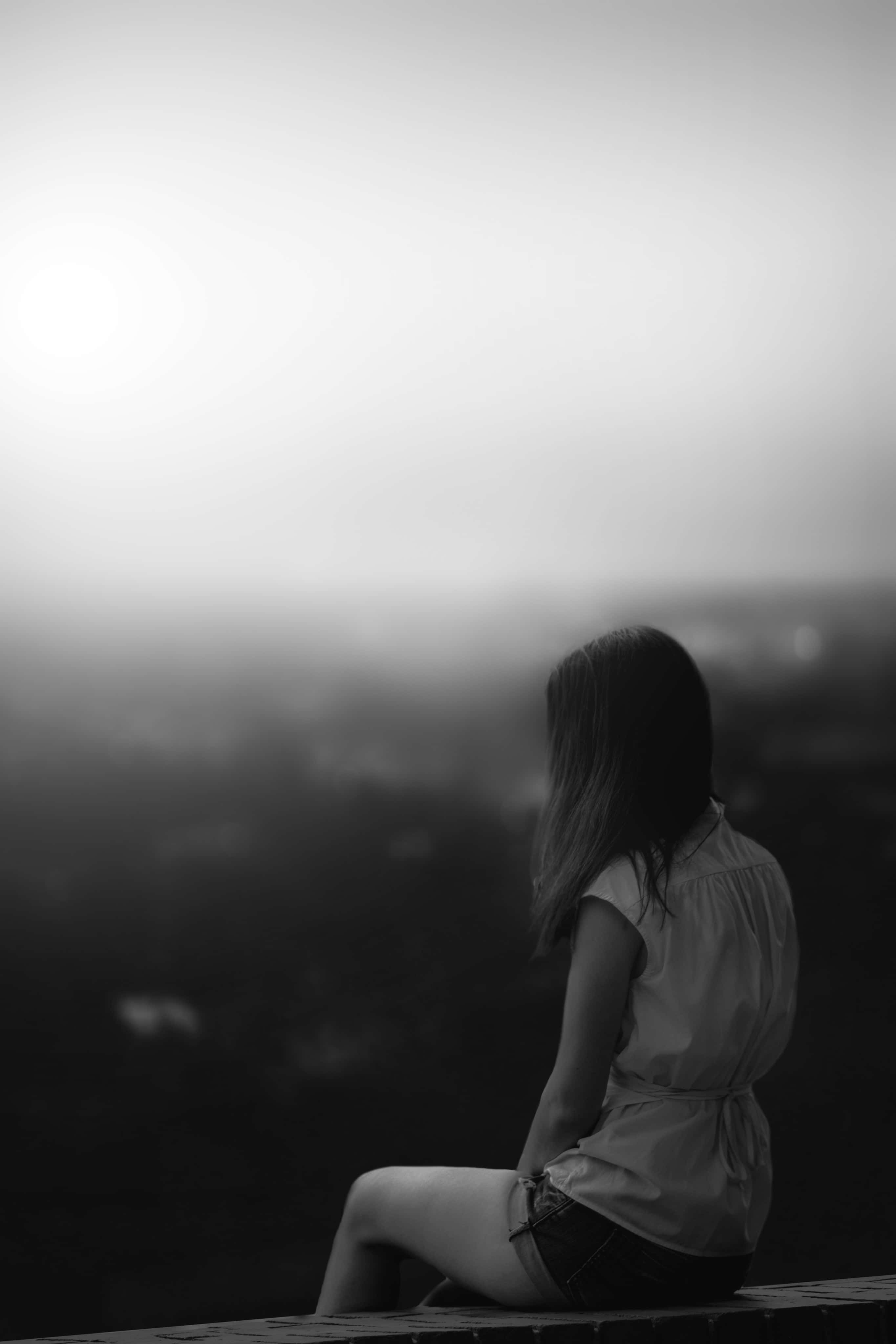 single woman, monochrome silhouette, hazy cityscape, 4K Phone Wallpaper