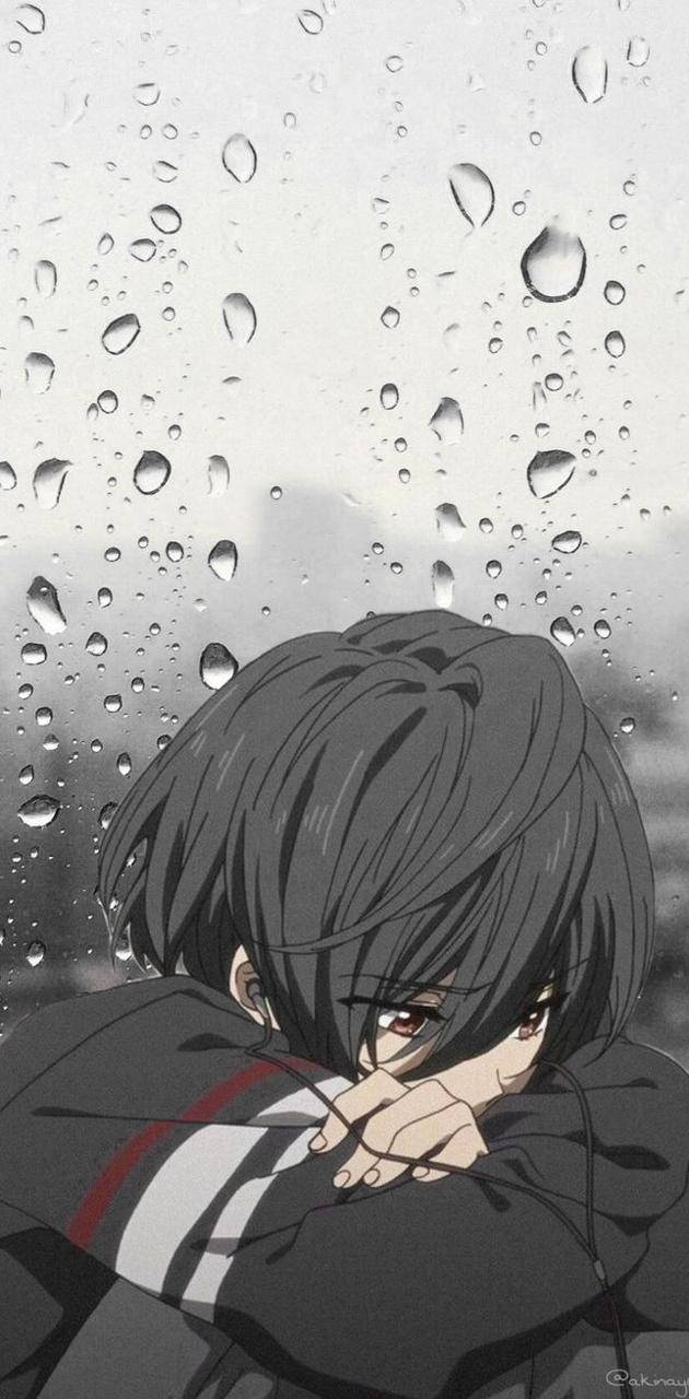 A melancholic anime boy with dark hair hugs his knees behind a rain-speckled window in grayscale tones., HD Phone Wallpaper