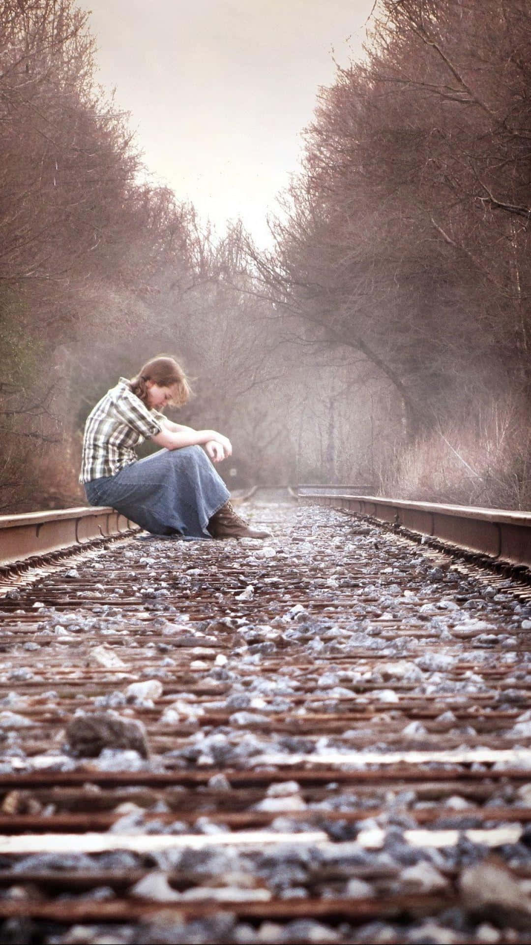 sad phone, lone person, weathered railroad tracks, Full HD Phone Wallpaper