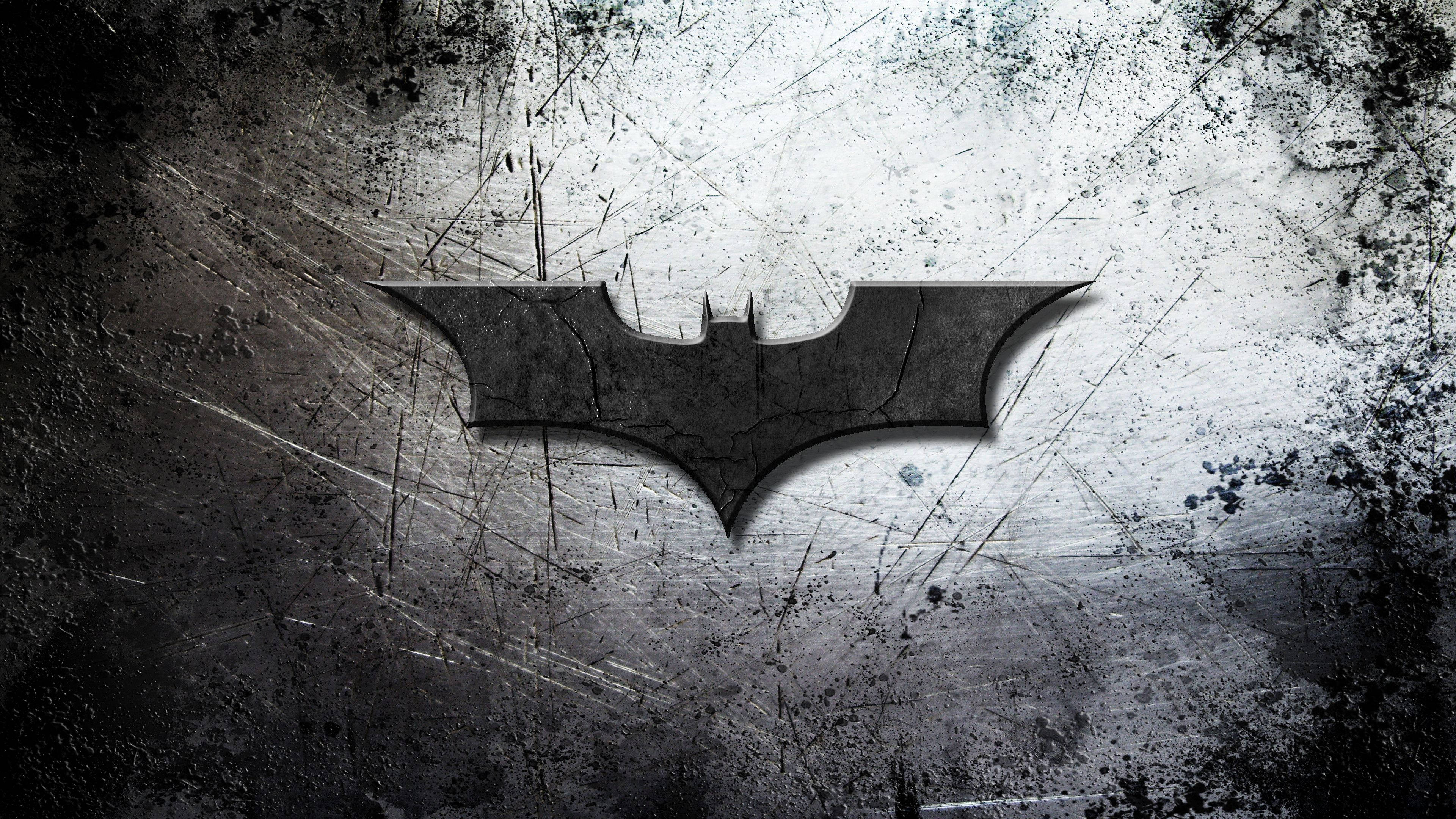 Batman logo, weathered, gritty metallic surface, 4K Desktop Wallpaper