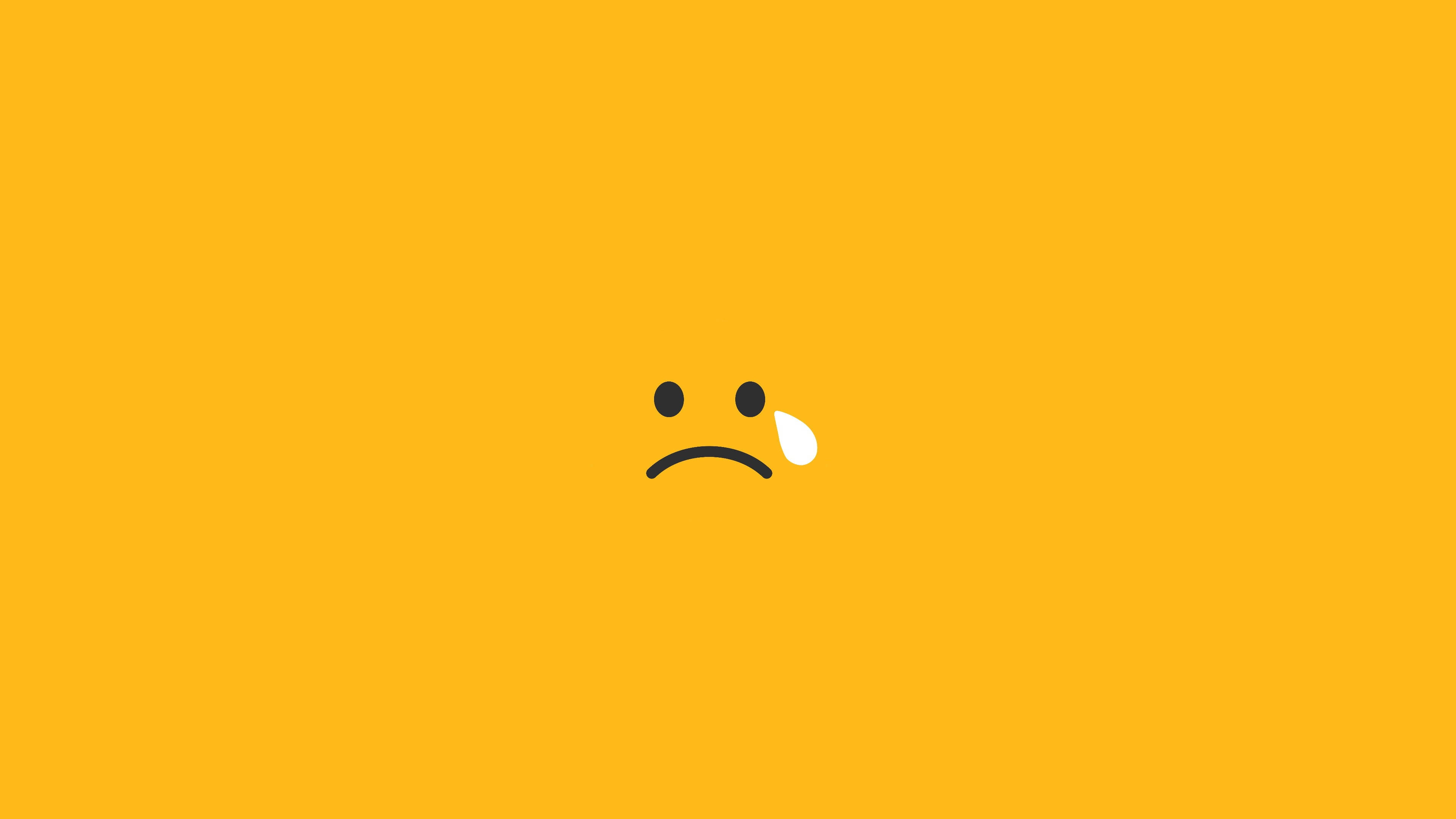 Crying Yellow Smiley, solid warm yellow background, single tear, 4K Desktop Wallpaper