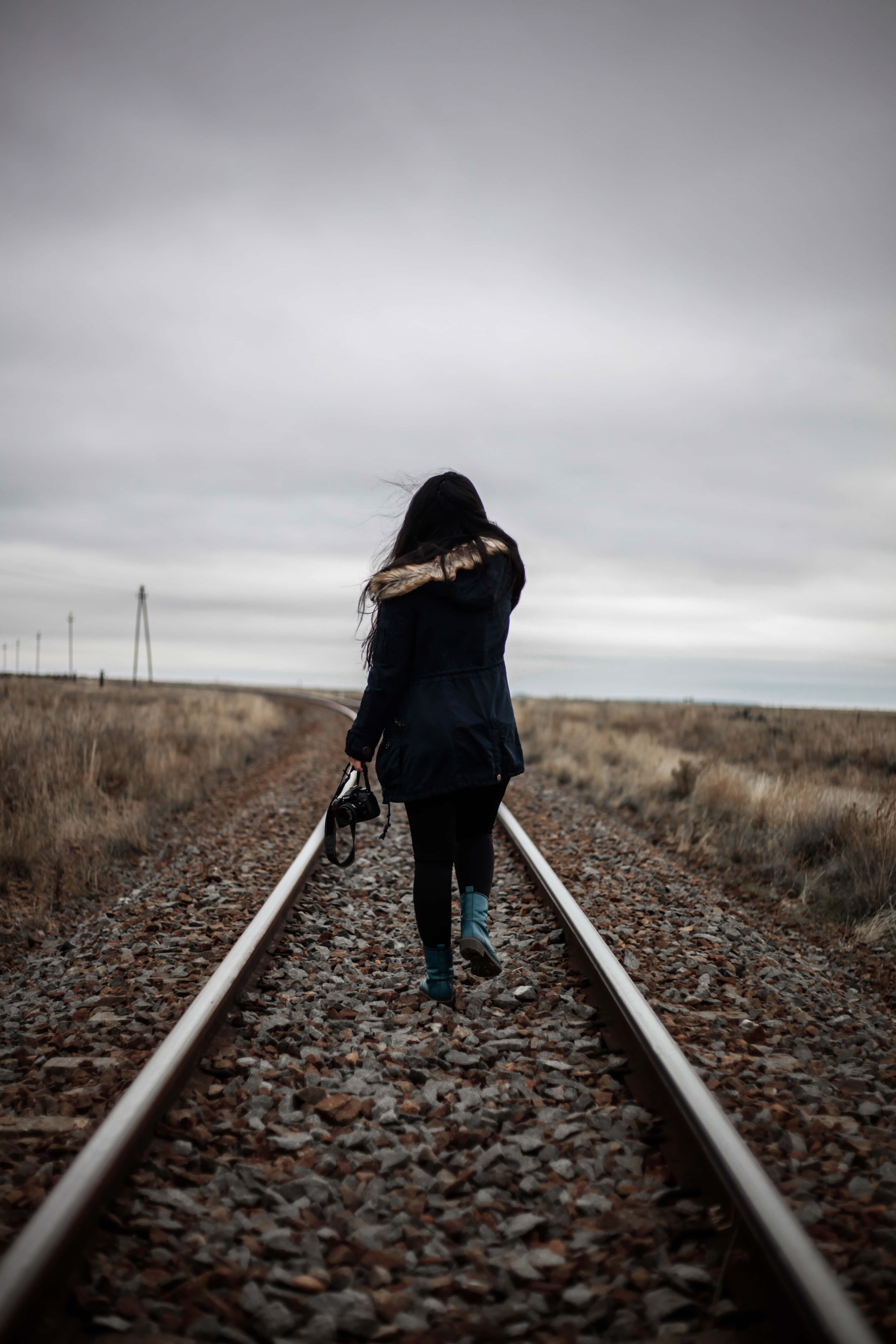 train tracks, desolate overcast field, lone person, 5K Phone Wallpaper