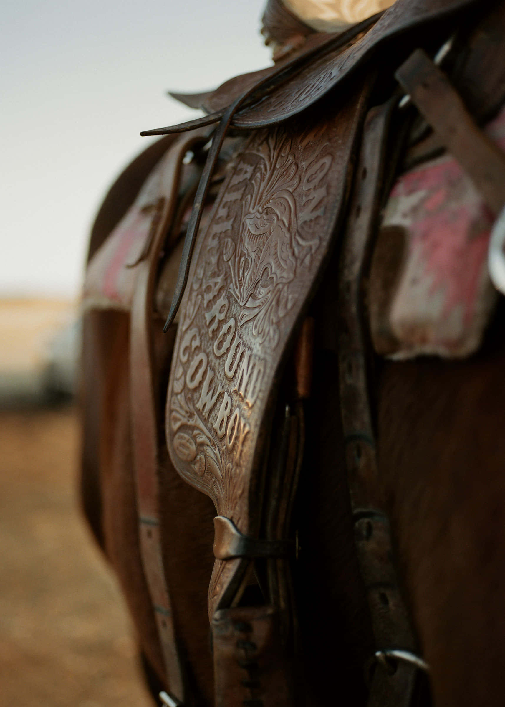 Round Cowboy, weathered leather saddle, ornate flap, Full HD Phone Wallpaper