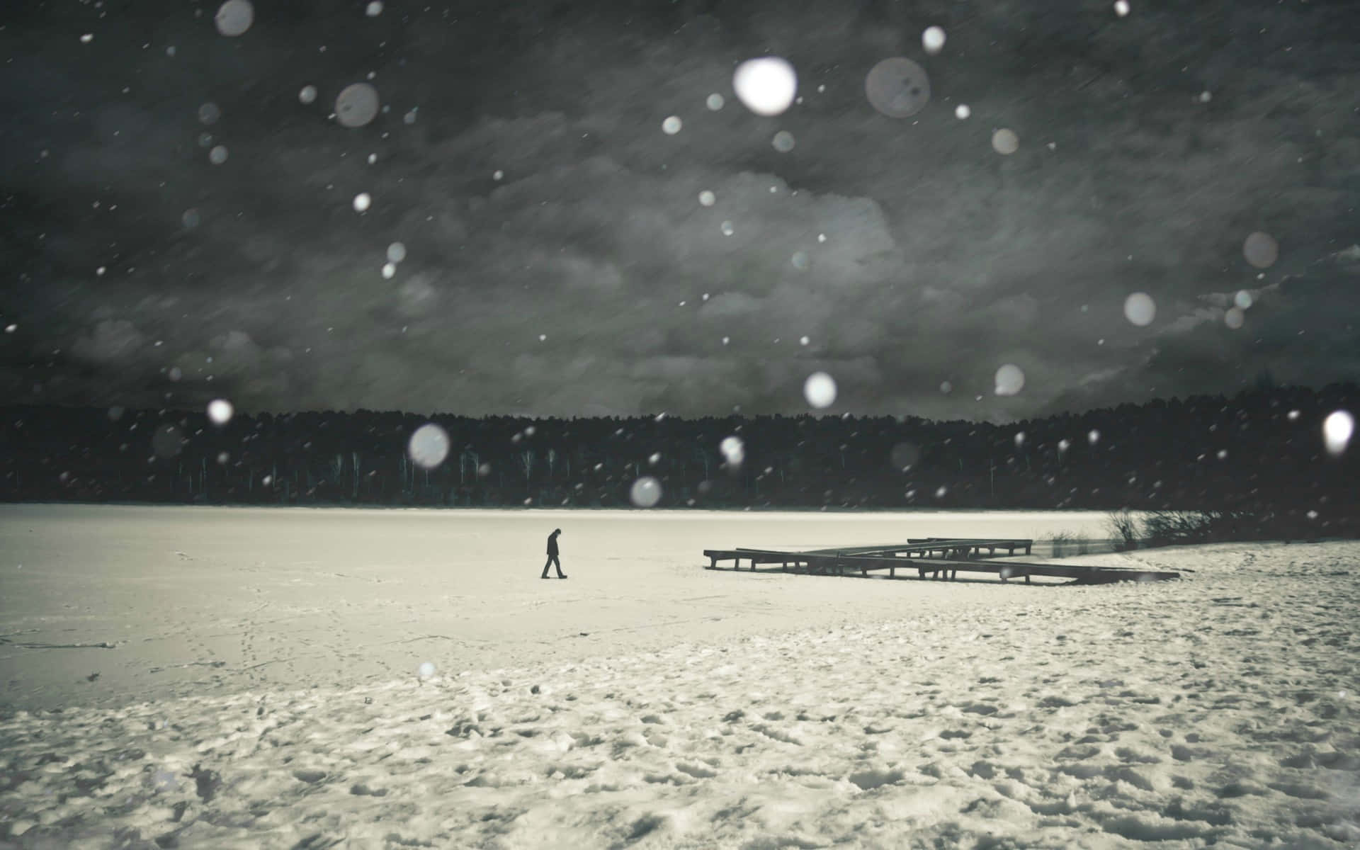 snow-covered frozen lake, dark stormy sky, falling snow, Full HD Desktop Wallpaper