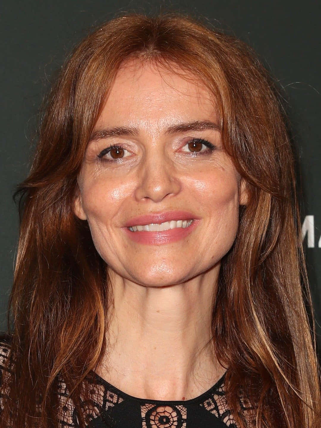 Saffron Burrows, black lace top, warm brown hair, HD Phone Wallpaper