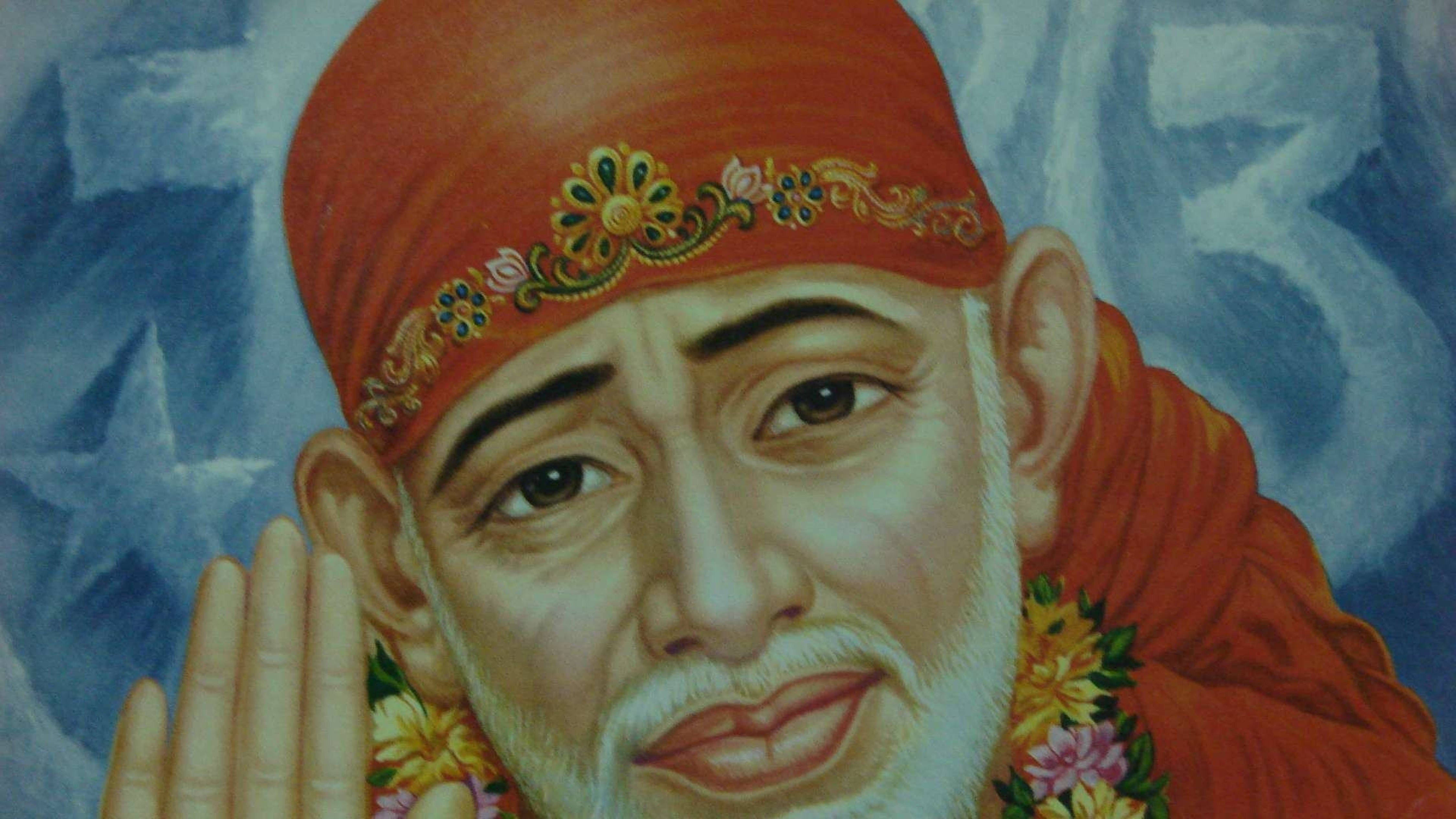 Sai Baba, red robes, turban adorned with floral embroidery, 4K Desktop Wallpaper