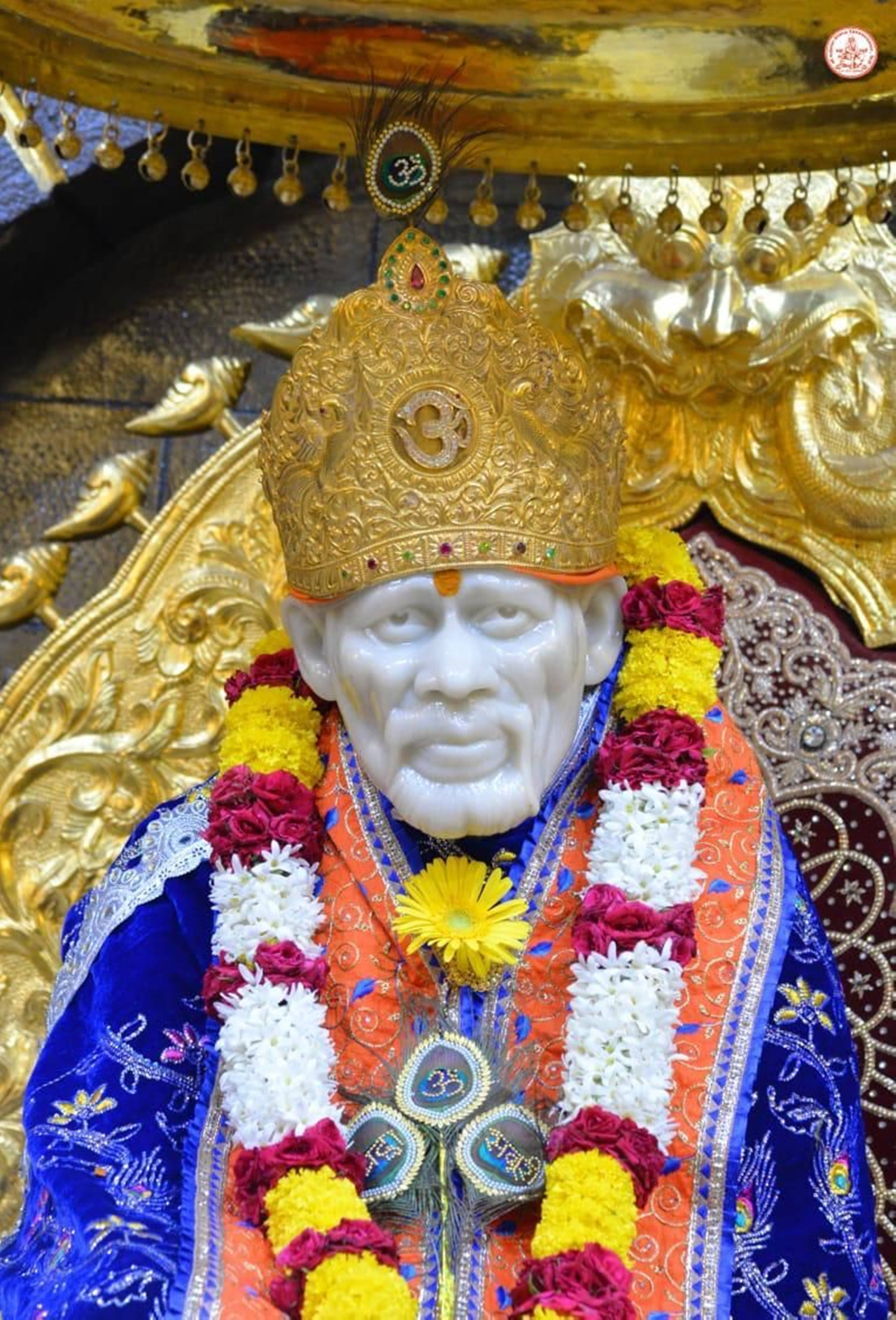 Sai Baba, white marble statue, golden crown jewels, 5K Phone Wallpaper
