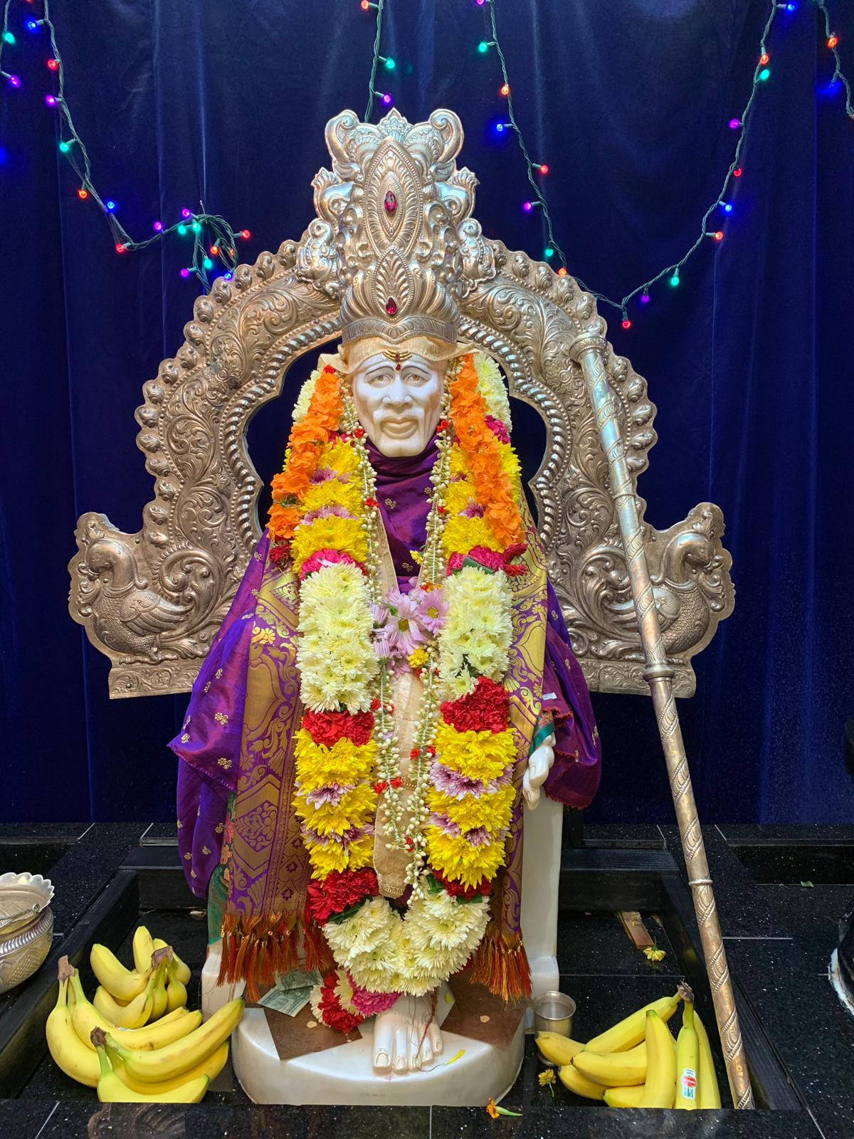 Sai Baba, white statue, vibrant orange yellow and red flower garlands, HD Phone Wallpaper