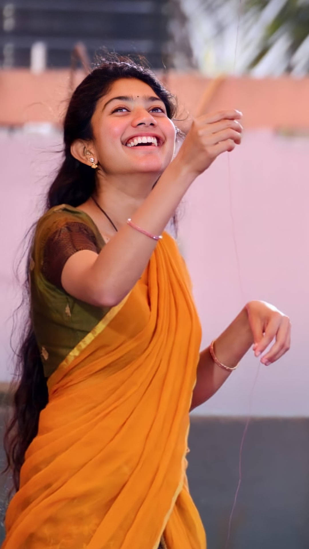 Sai Pallavi, vibrant orange sari, kite, Full HD Phone Wallpaper