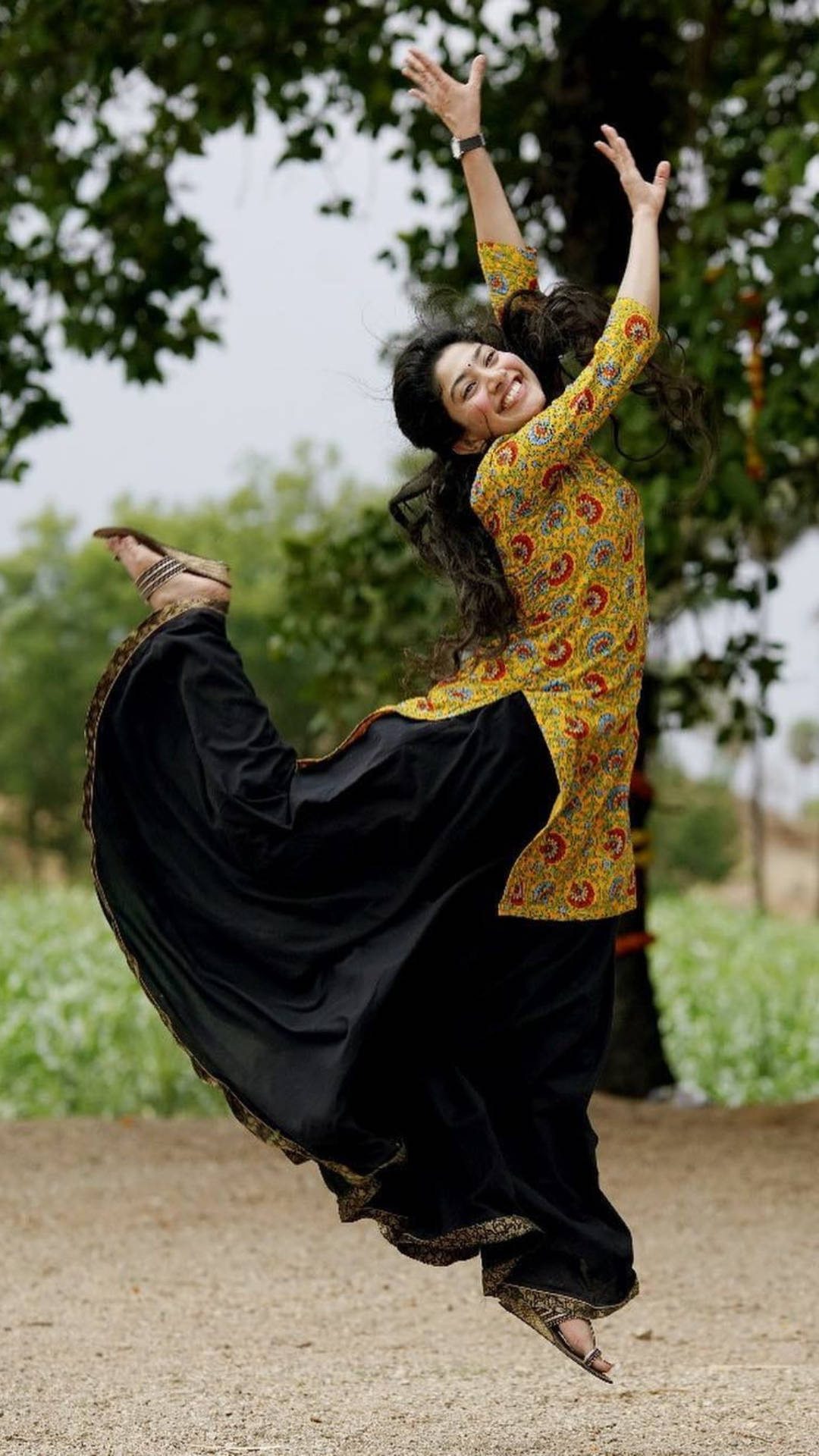 Sai Pallavi, yellow patterned top, black flowing pants, Full HD Phone Wallpaper